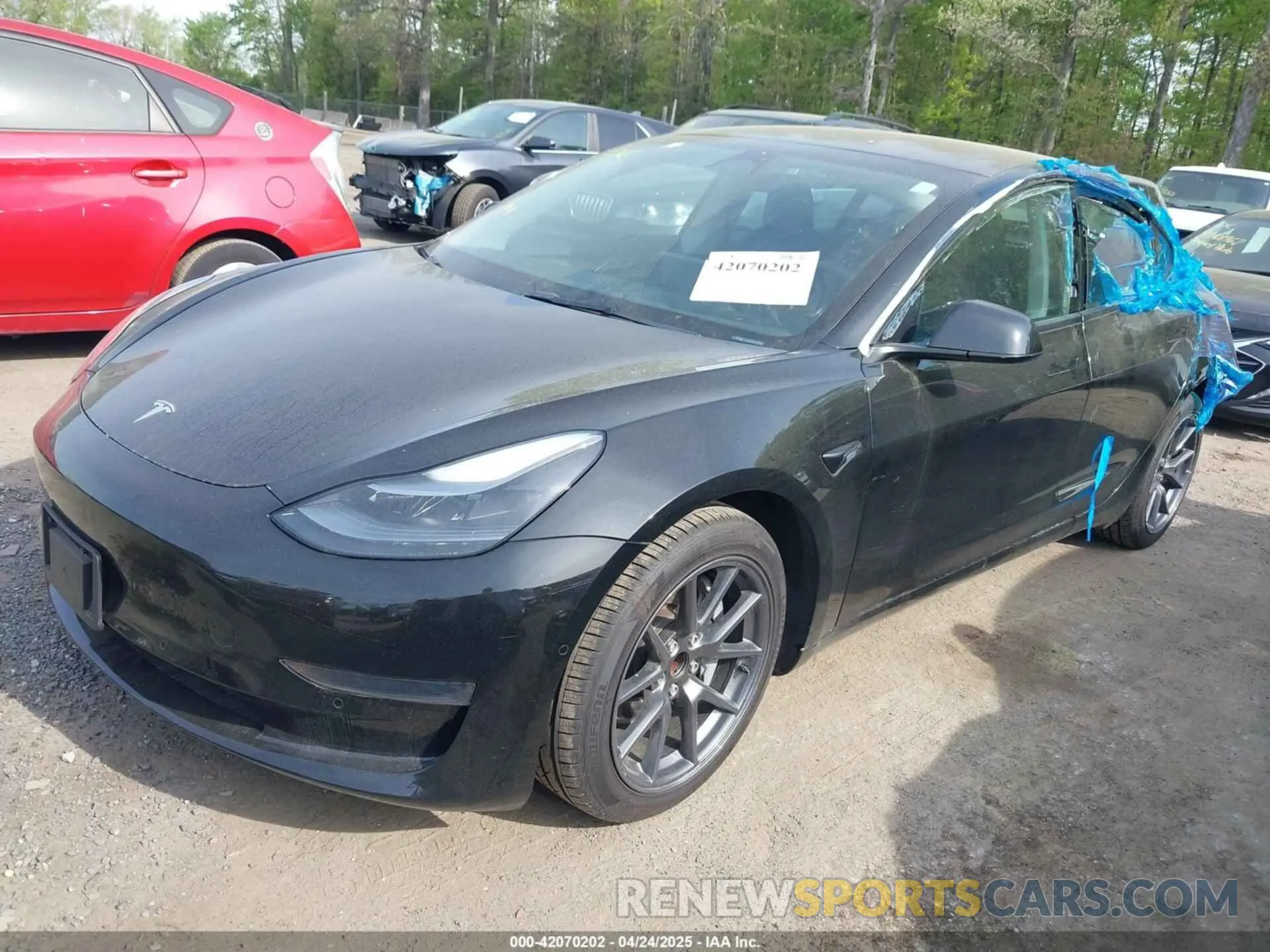 2 fotografías del automóvil dañado 5YJ3E1EA5NF102196 TESLA MODEL 3 2022