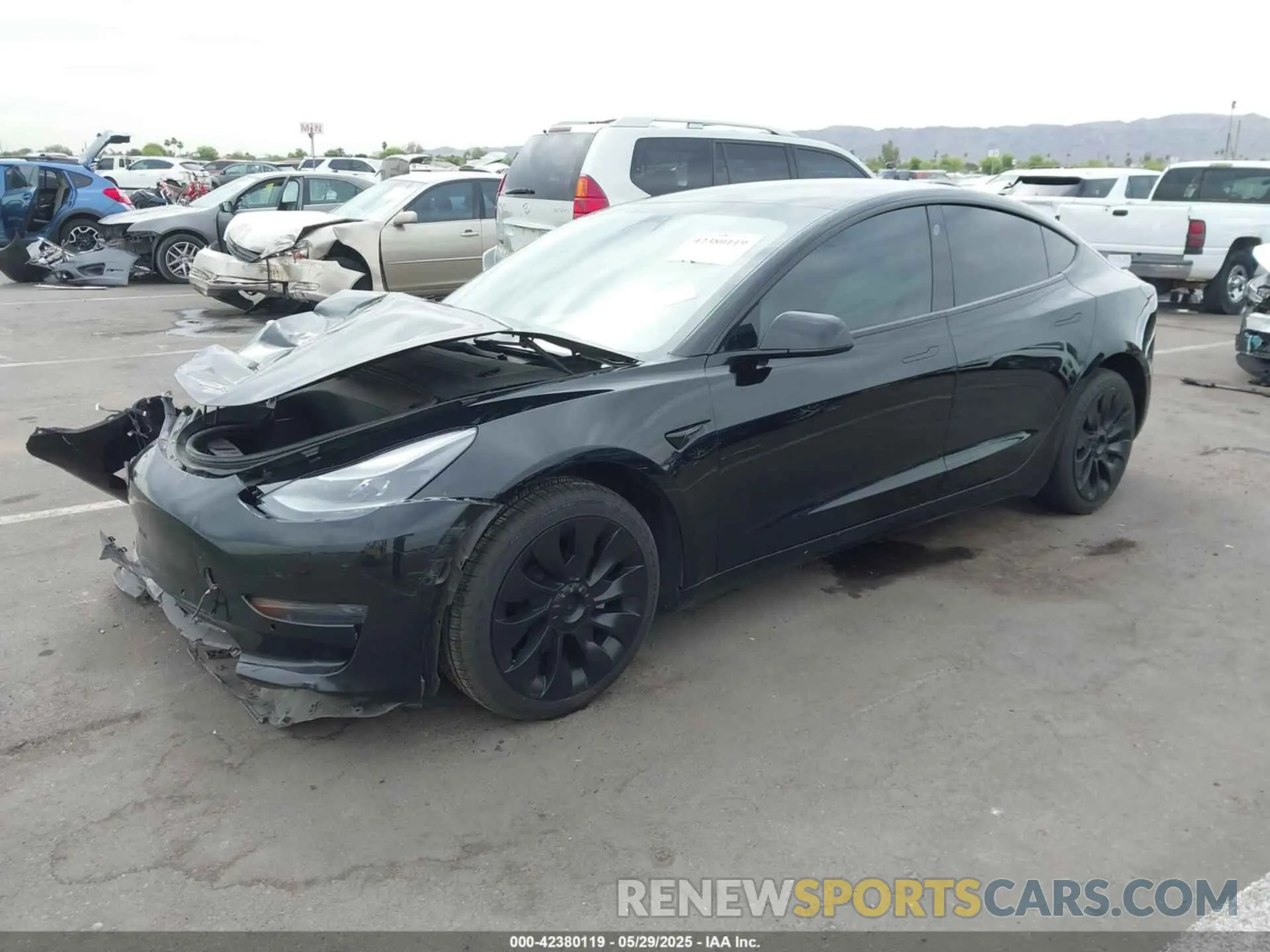2 fotografías del automóvil dañado 5YJ3E1EA5NF136199 TESLA MODEL 3 2022