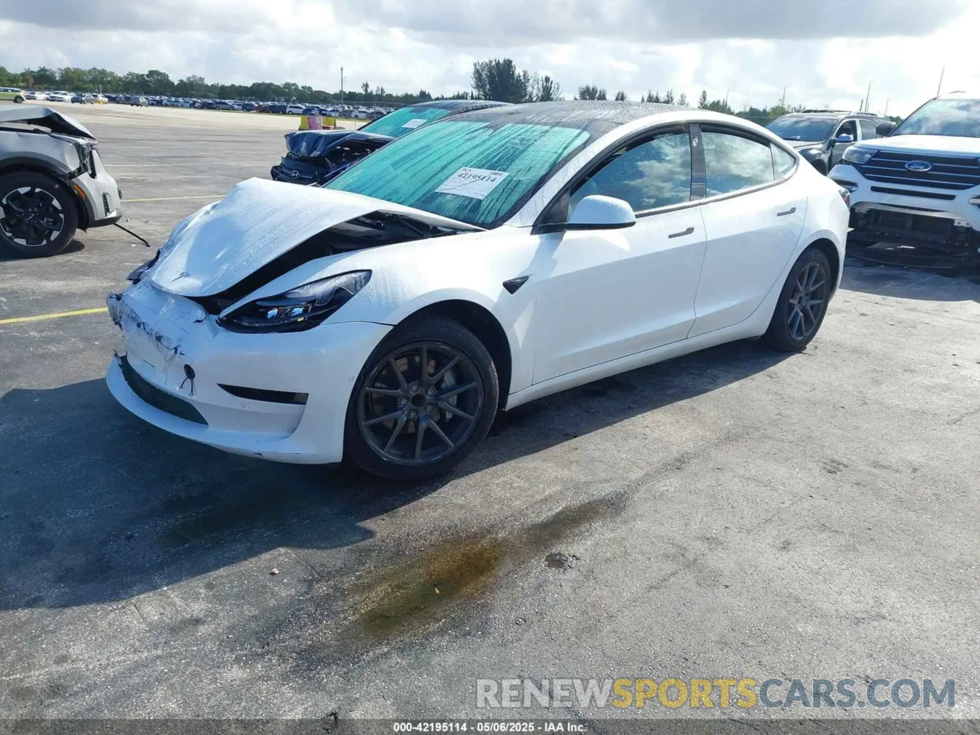 2 fotografías del automóvil dañado 5YJ3E1EA5NF164309 TESLA MODEL 3 2022
