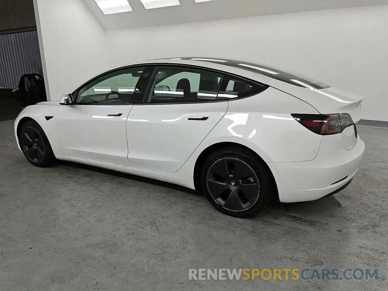 2 fotografías del automóvil dañado 5YJ3E1EA5NF289715 TESLA MODEL 3 2022