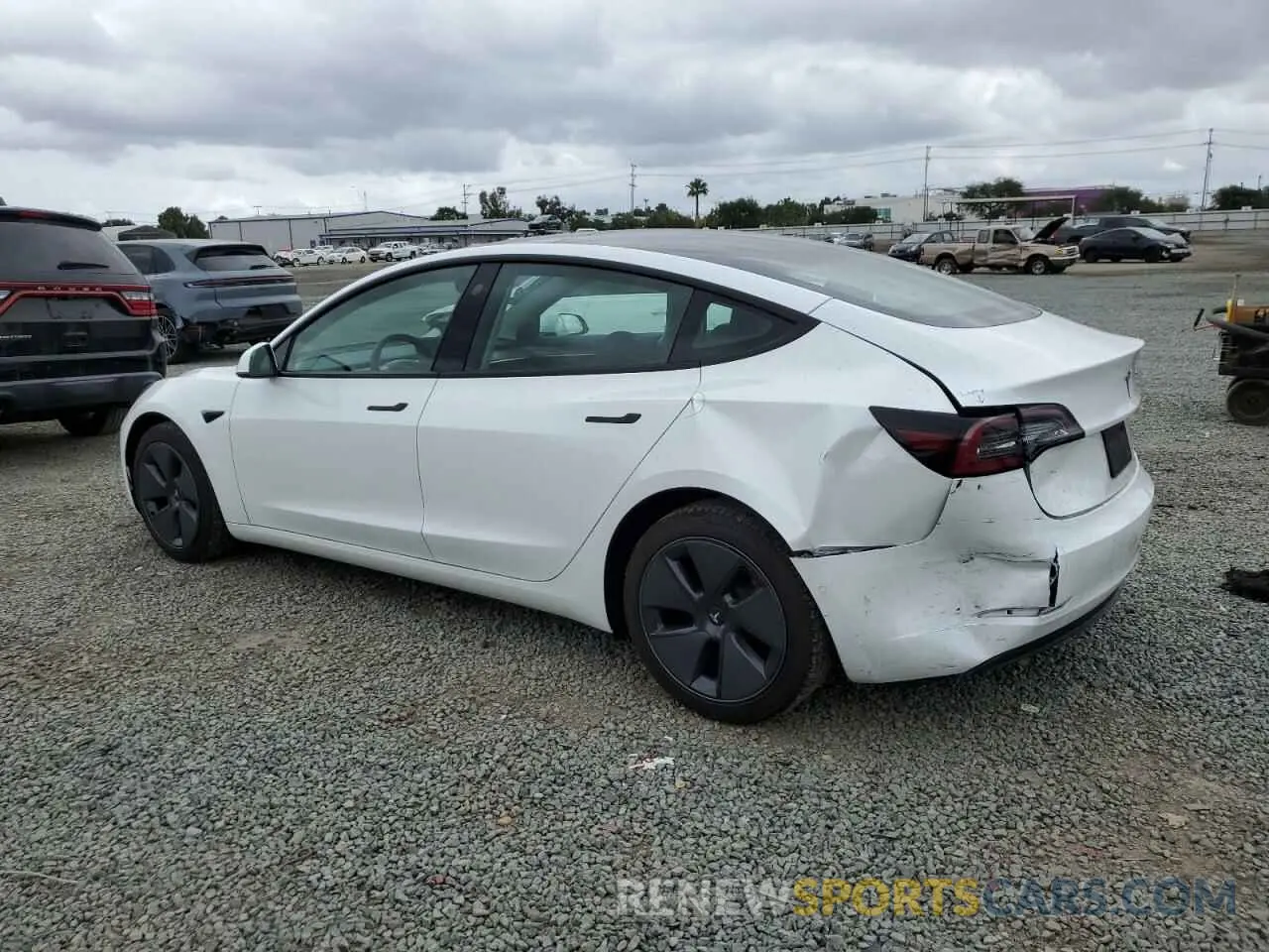2 fotografías del automóvil dañado 5YJ3E1EA5NF321935 TESLA MODEL 3 2022