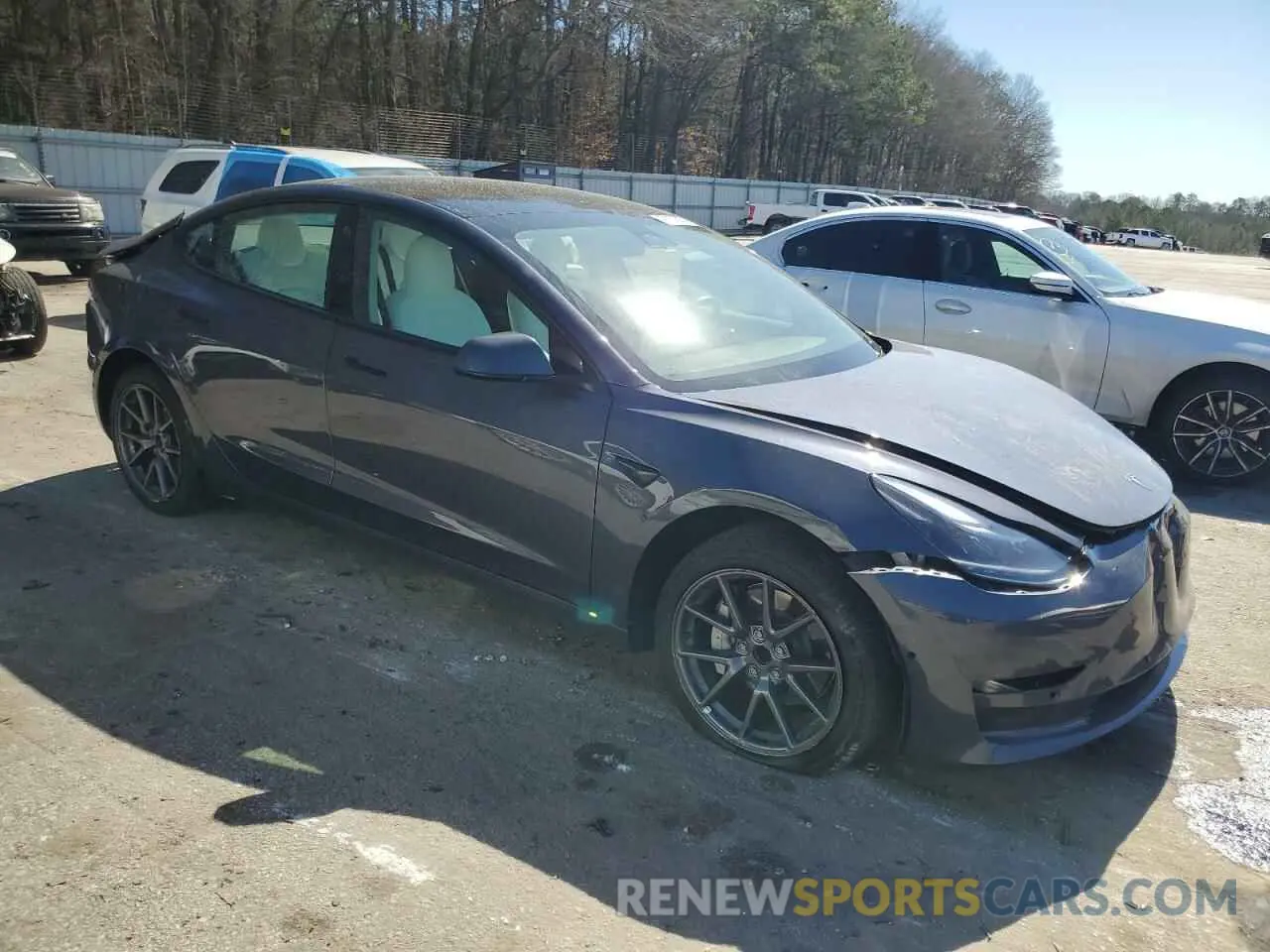 4 fotografías del automóvil dañado 5YJ3E1EA5NF339769 TESLA MODEL 3 2022