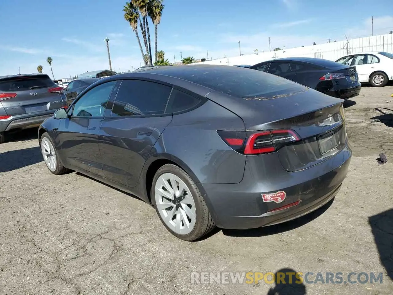 2 fotografías del automóvil dañado 5YJ3E1EA6NF143209 TESLA MODEL 3 2022