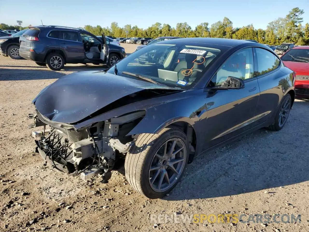 2 fotografías del automóvil dañado 5YJ3E1EA6NF189980 TESLA MODEL 3 2022