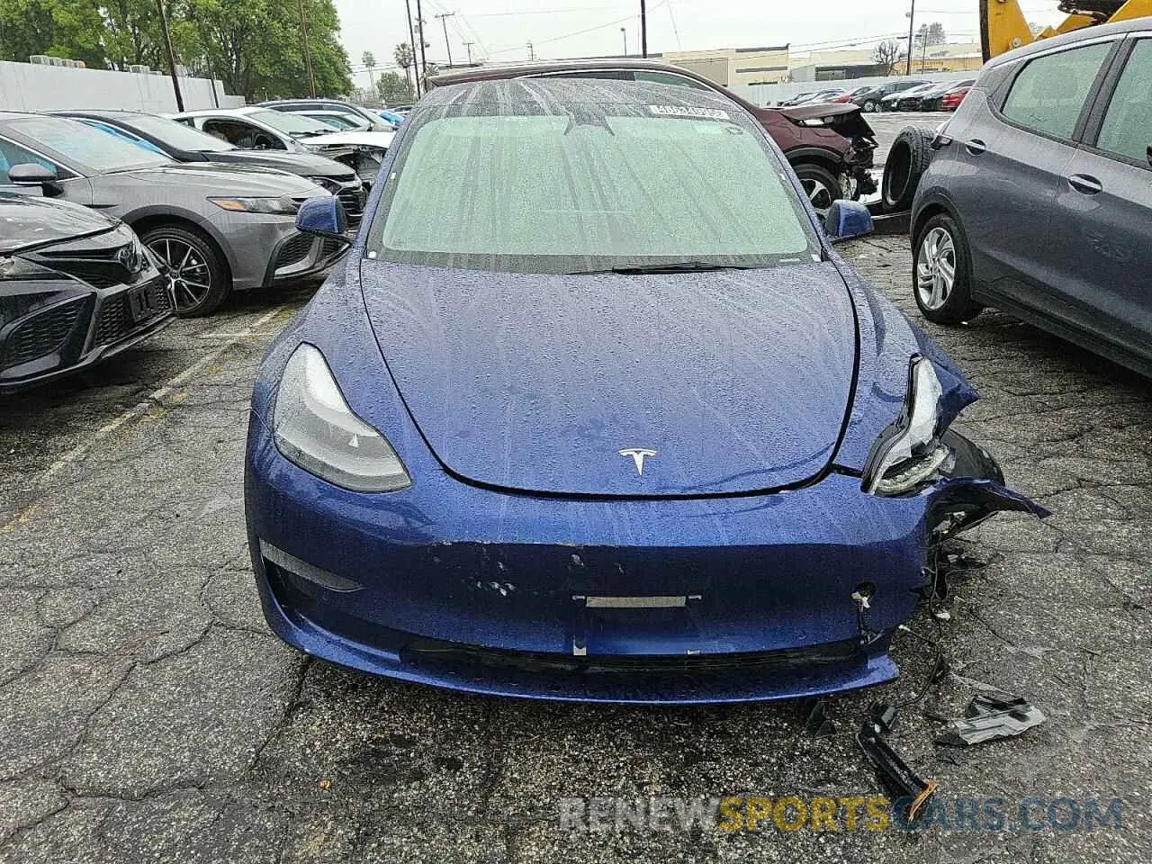 5 fotografías del automóvil dañado 5YJ3E1EA6NF304433 TESLA MODEL 3 2022