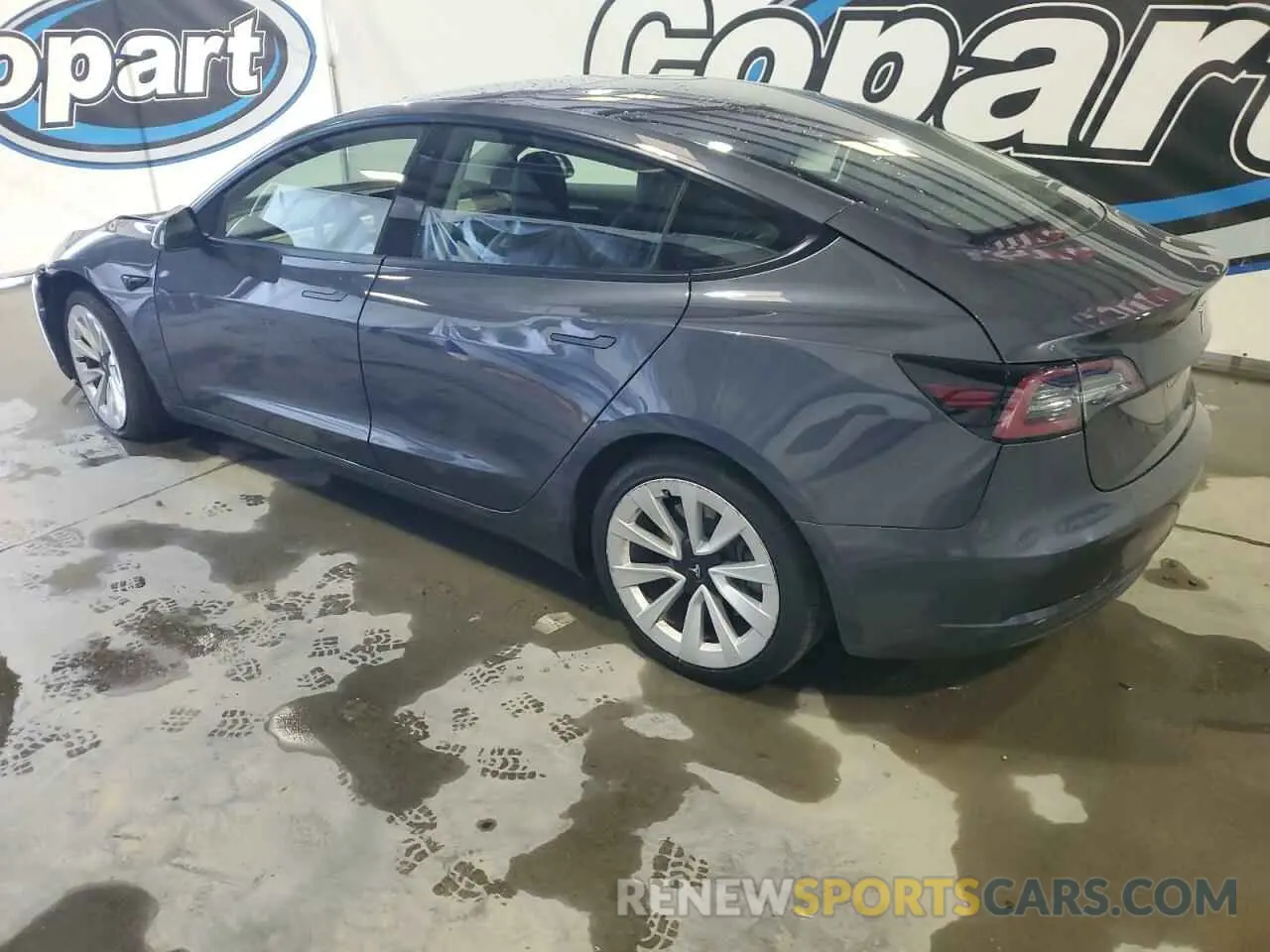 2 fotografías del automóvil dañado 5YJ3E1EA6NF304447 TESLA MODEL 3 2022