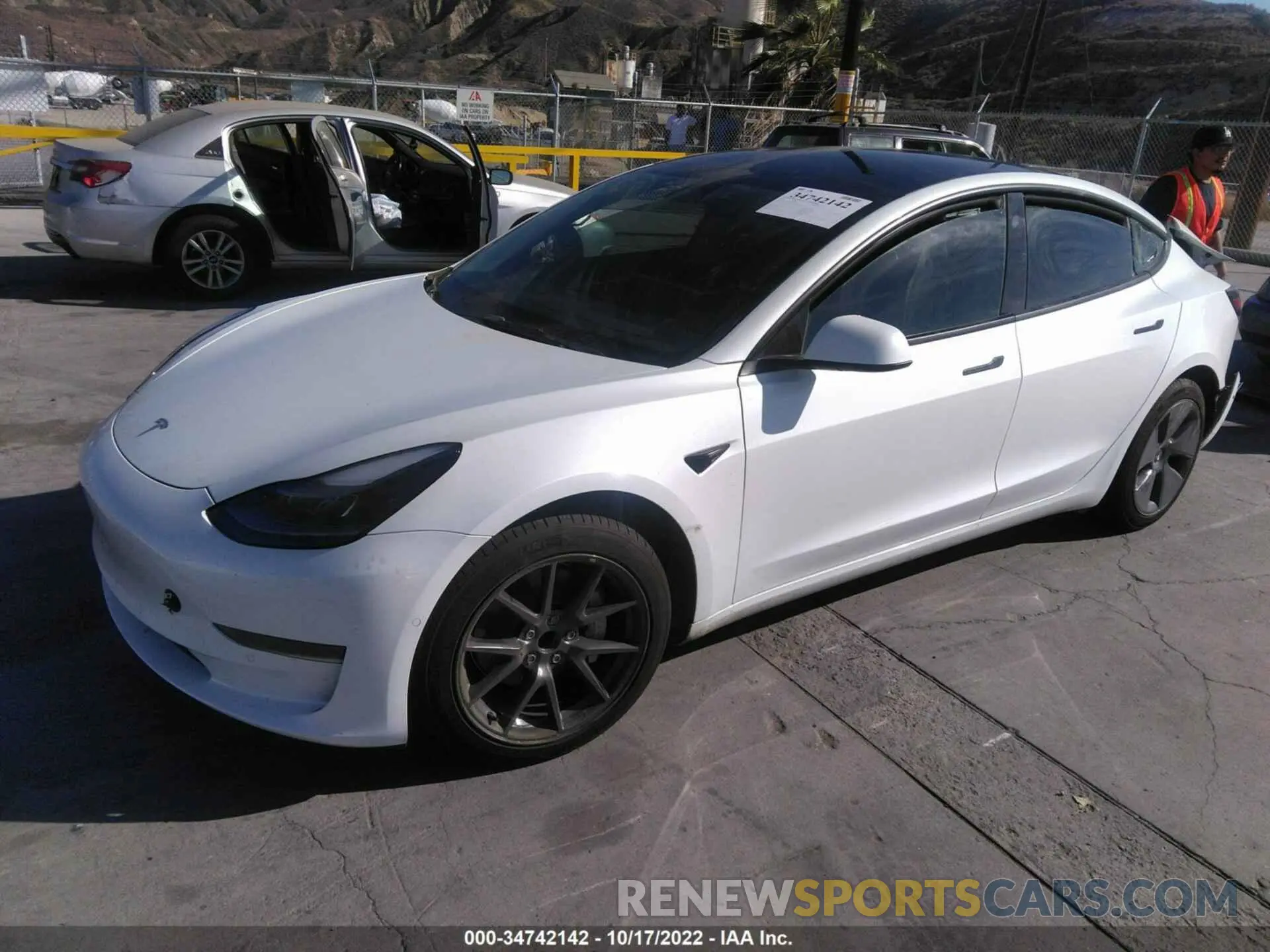 2 fotografías del automóvil dañado 5YJ3E1EA6NF322348 TESLA MODEL 3 2022