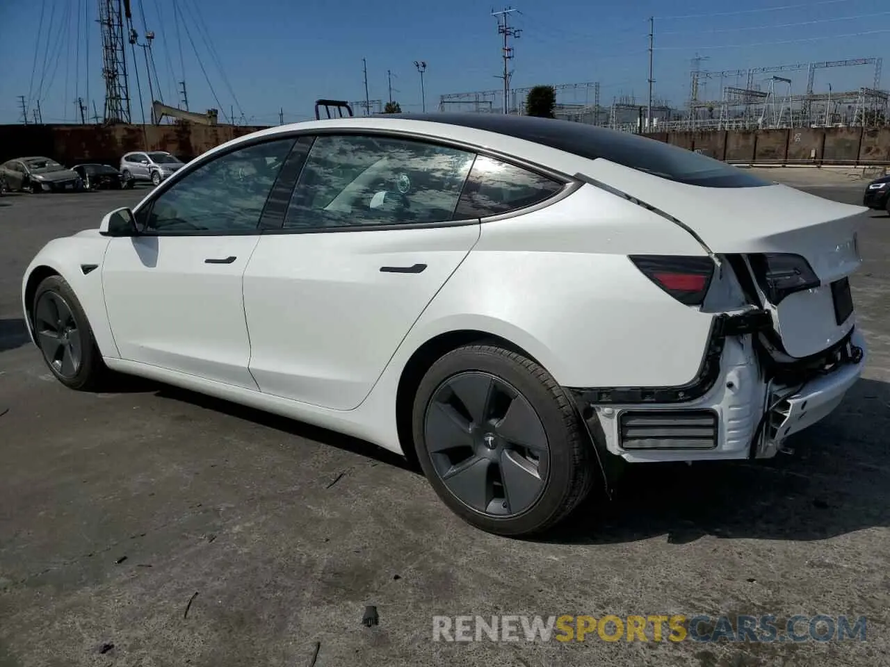 2 fotografías del automóvil dañado 5YJ3E1EA6NF331051 TESLA MODEL 3 2022