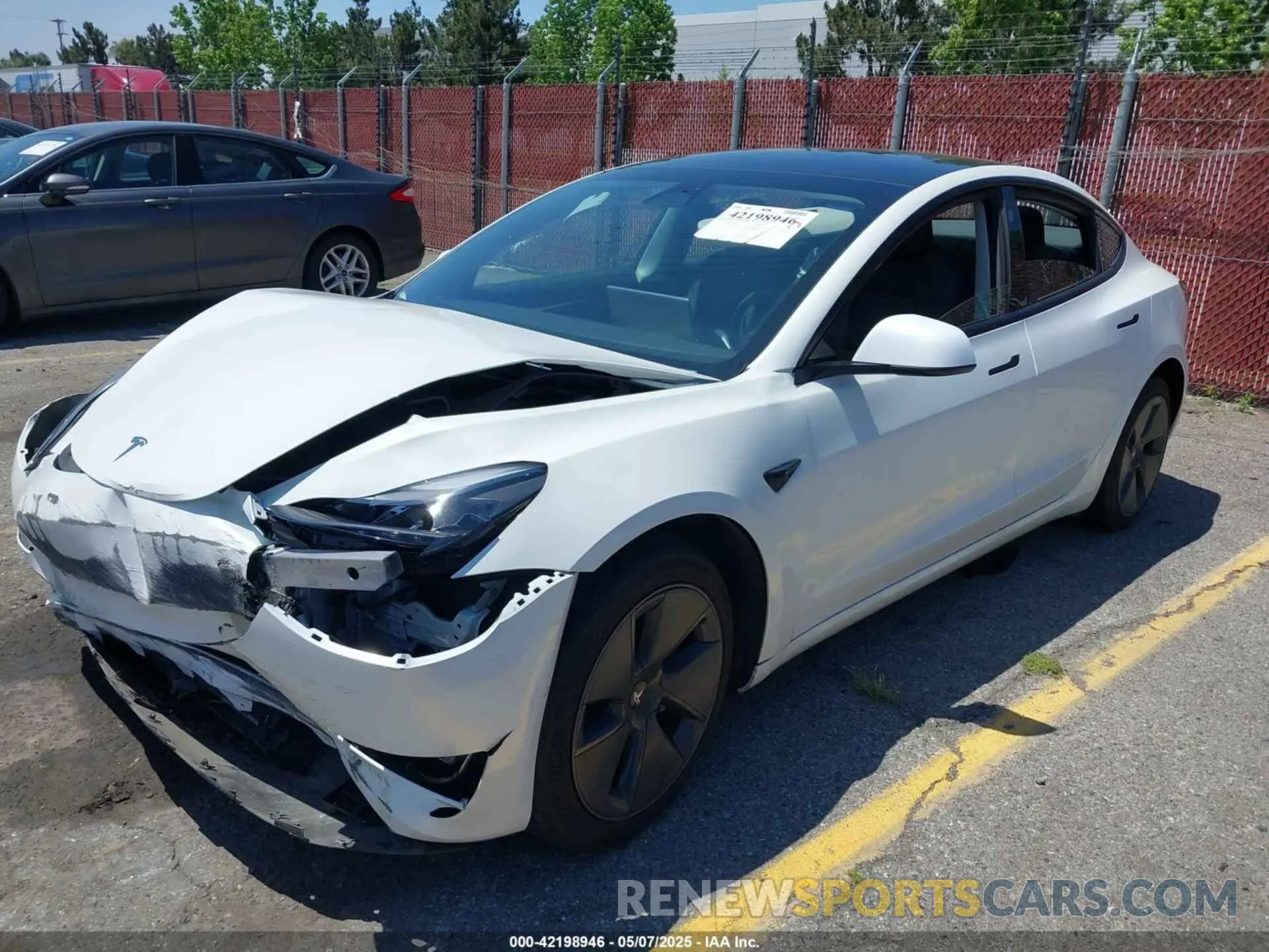 2 fotografías del automóvil dañado 5YJ3E1EA6NF332281 TESLA MODEL 3 2022