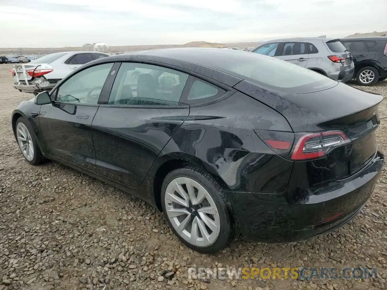 2 fotografías del automóvil dañado 5YJ3E1EA7NF371459 TESLA MODEL 3 2022