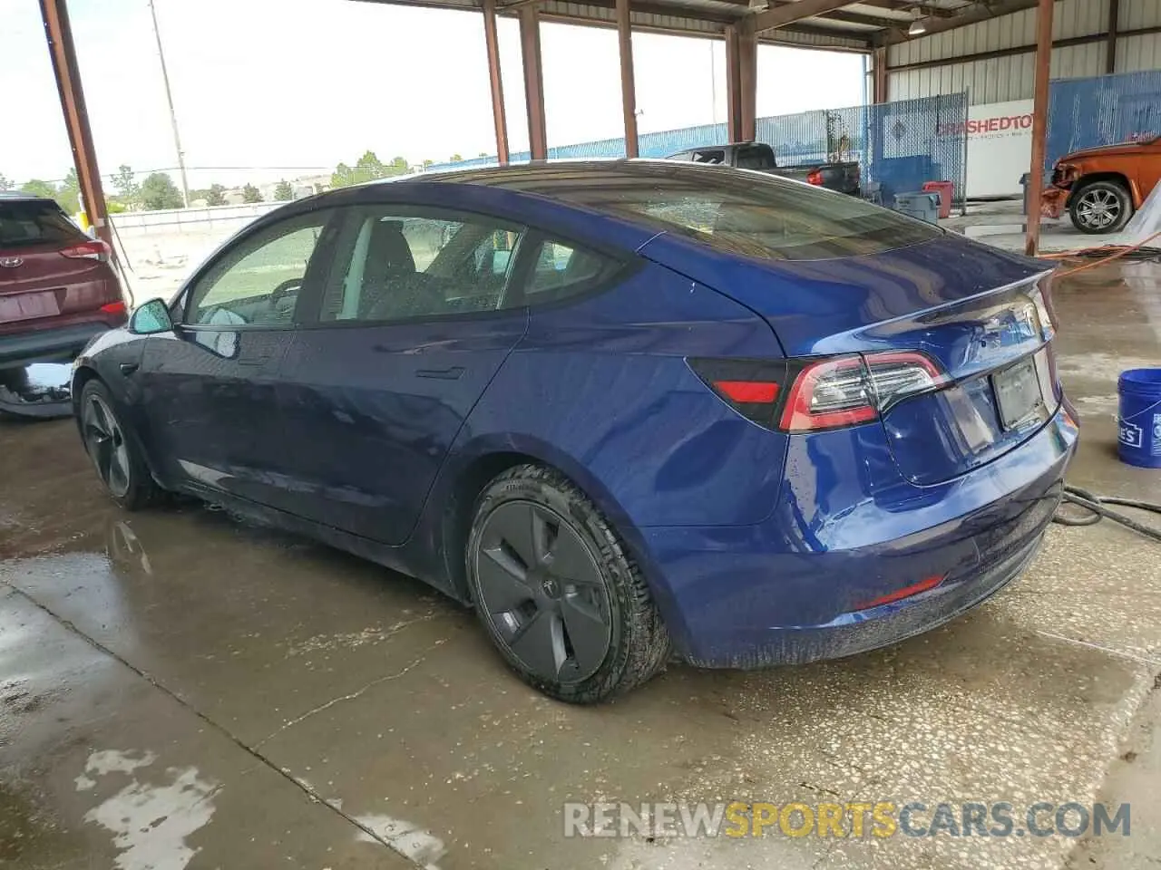2 fotografías del automóvil dañado 5YJ3E1EA8NF189947 TESLA MODEL 3 2022