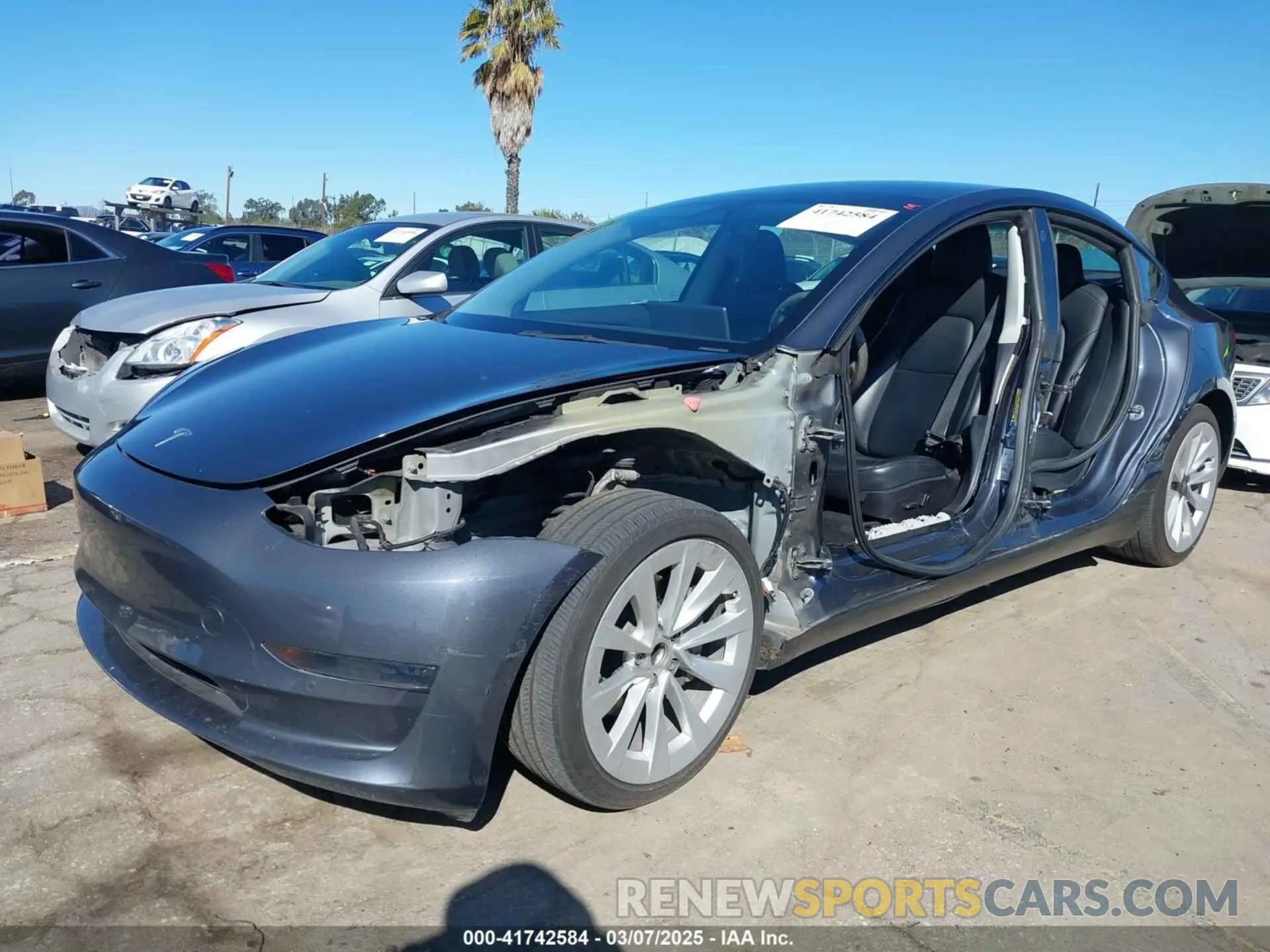 2 fotografías del automóvil dañado 5YJ3E1EA8NF241691 TESLA MODEL 3 2022