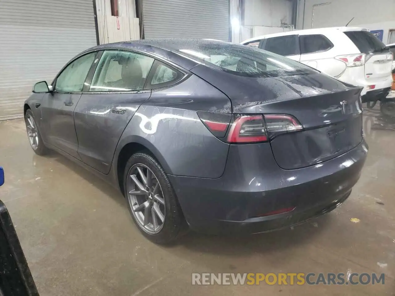 2 fotografías del automóvil dañado 5YJ3E1EA8NF287070 TESLA MODEL 3 2022