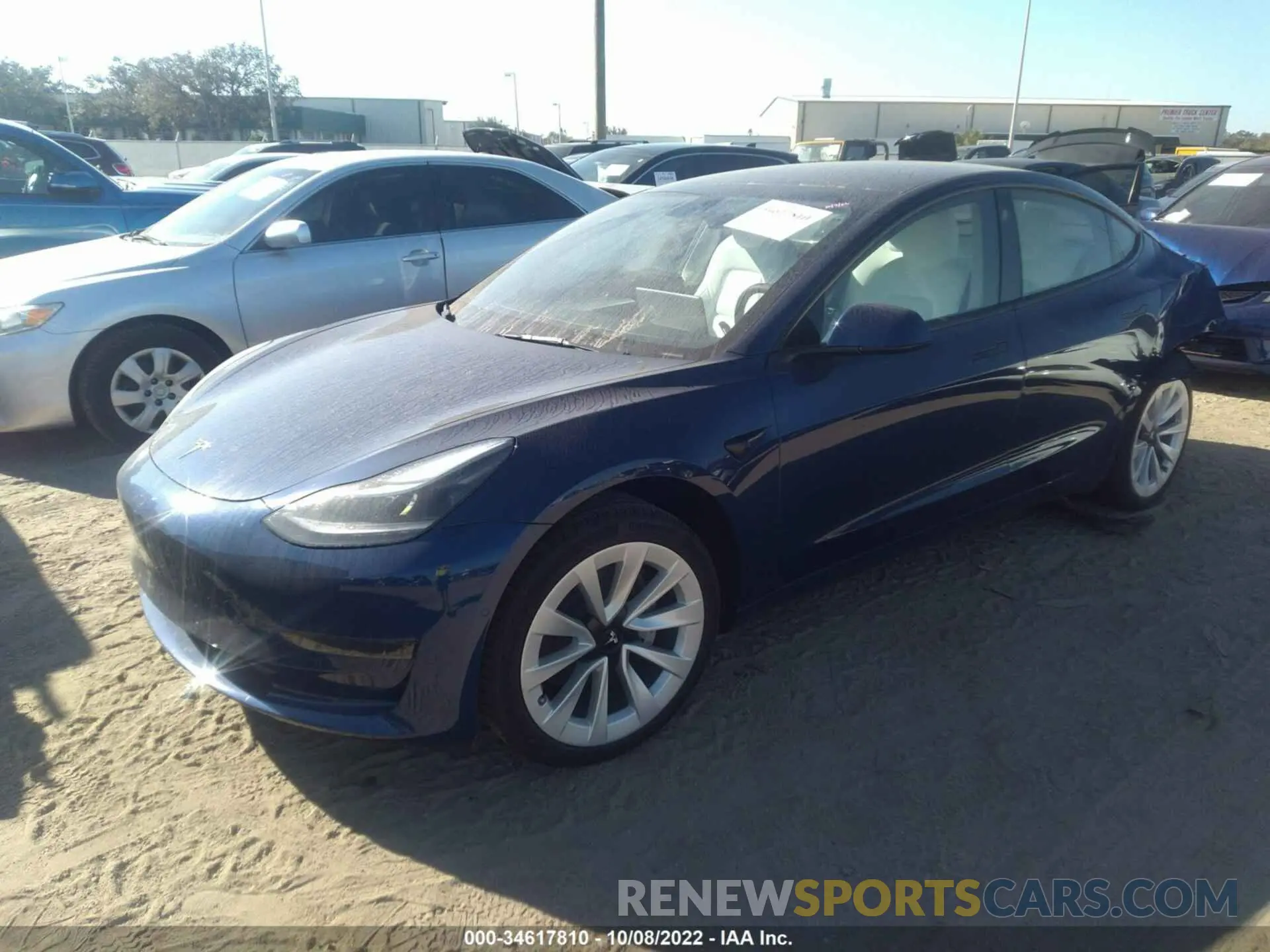 2 fotografías del automóvil dañado 5YJ3E1EA9NF312607 TESLA MODEL 3 2022