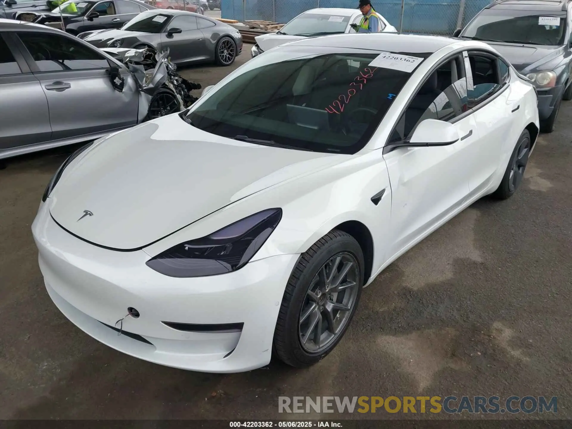 2 fotografías del automóvil dañado 5YJ3E1EAXNF117101 TESLA MODEL 3 2022