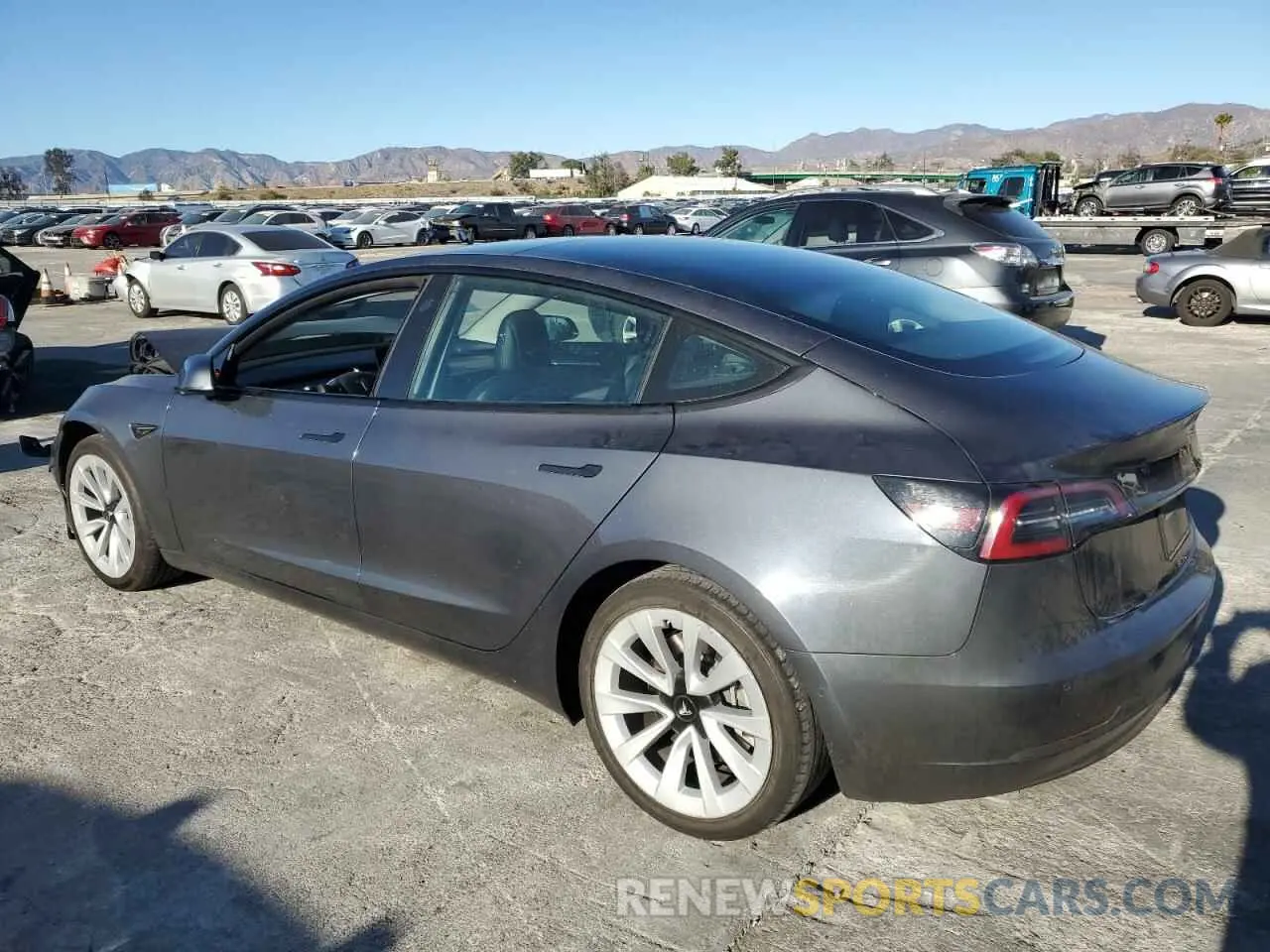 2 fotografías del automóvil dañado 5YJ3E1EAXNF142709 TESLA MODEL 3 2022