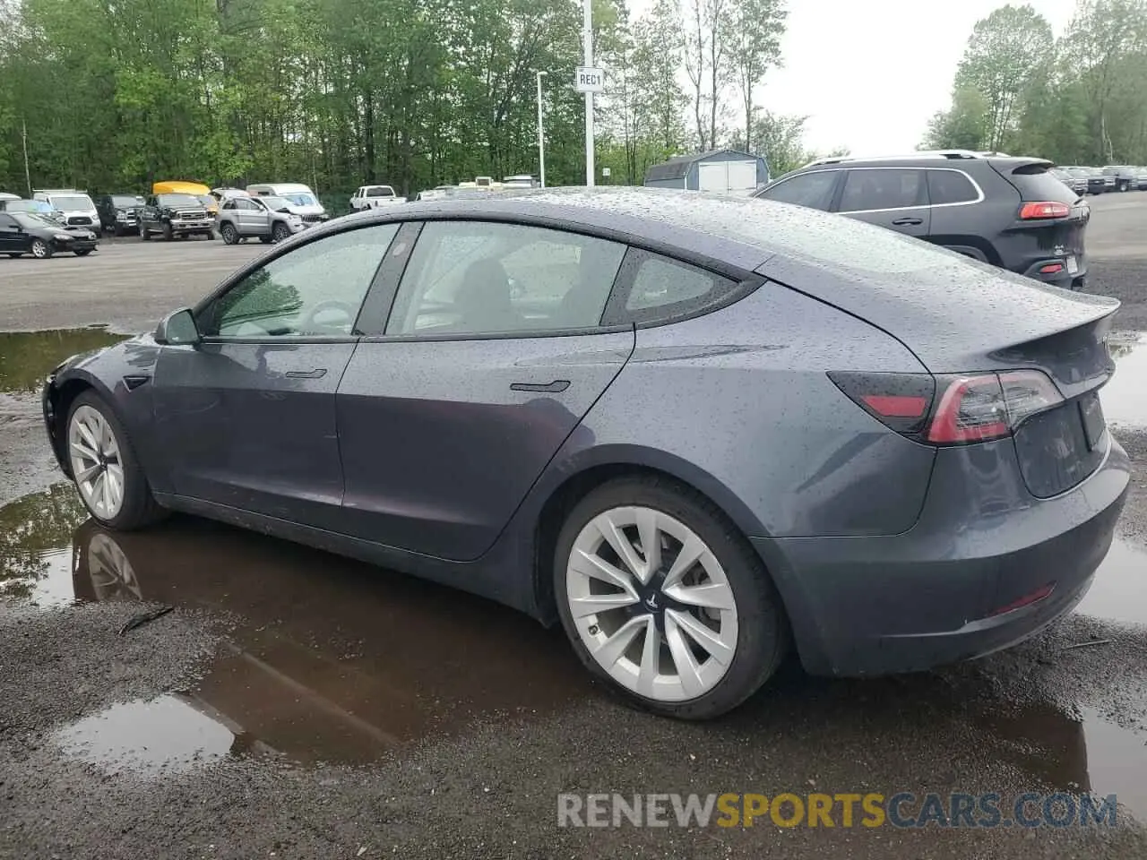2 fotografías del automóvil dañado 5YJ3E1EAXNF289919 TESLA MODEL 3 2022