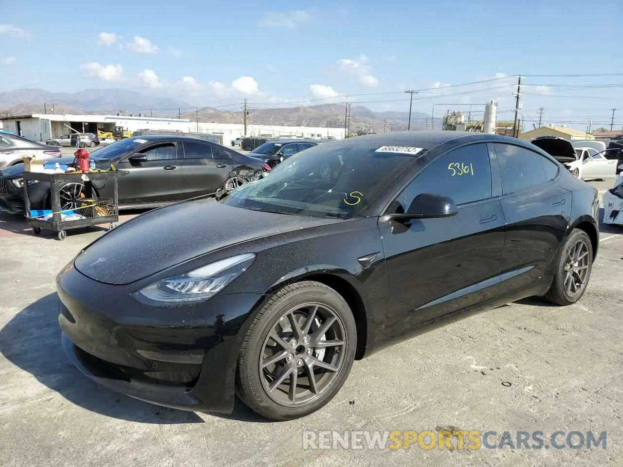 2 fotografías del automóvil dañado 5YJ3E1EAXNF293985 TESLA MODEL 3 2022