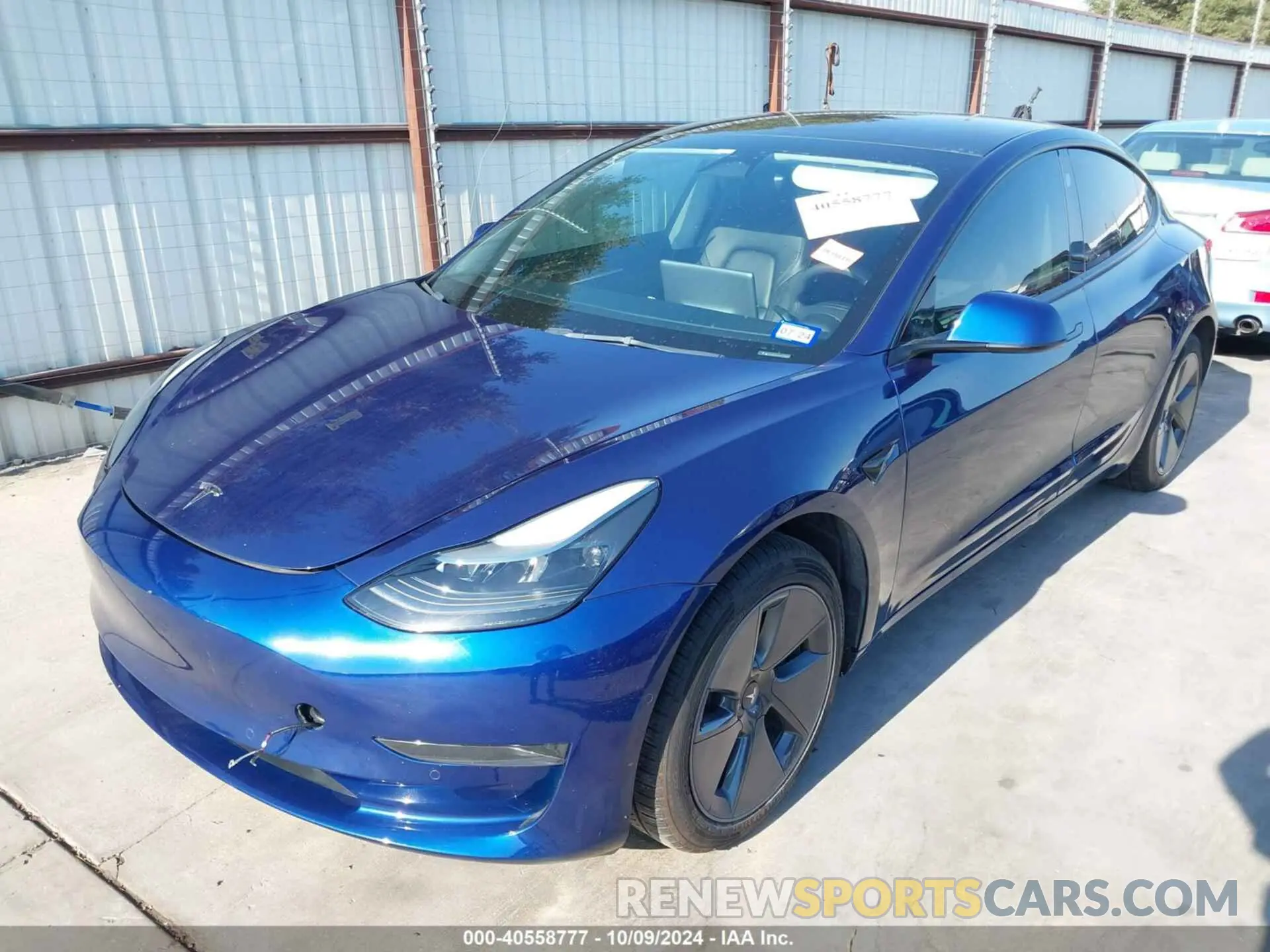 2 fotografías del automóvil dañado 5YJ3E1EAXNF305813 TESLA MODEL 3 2022