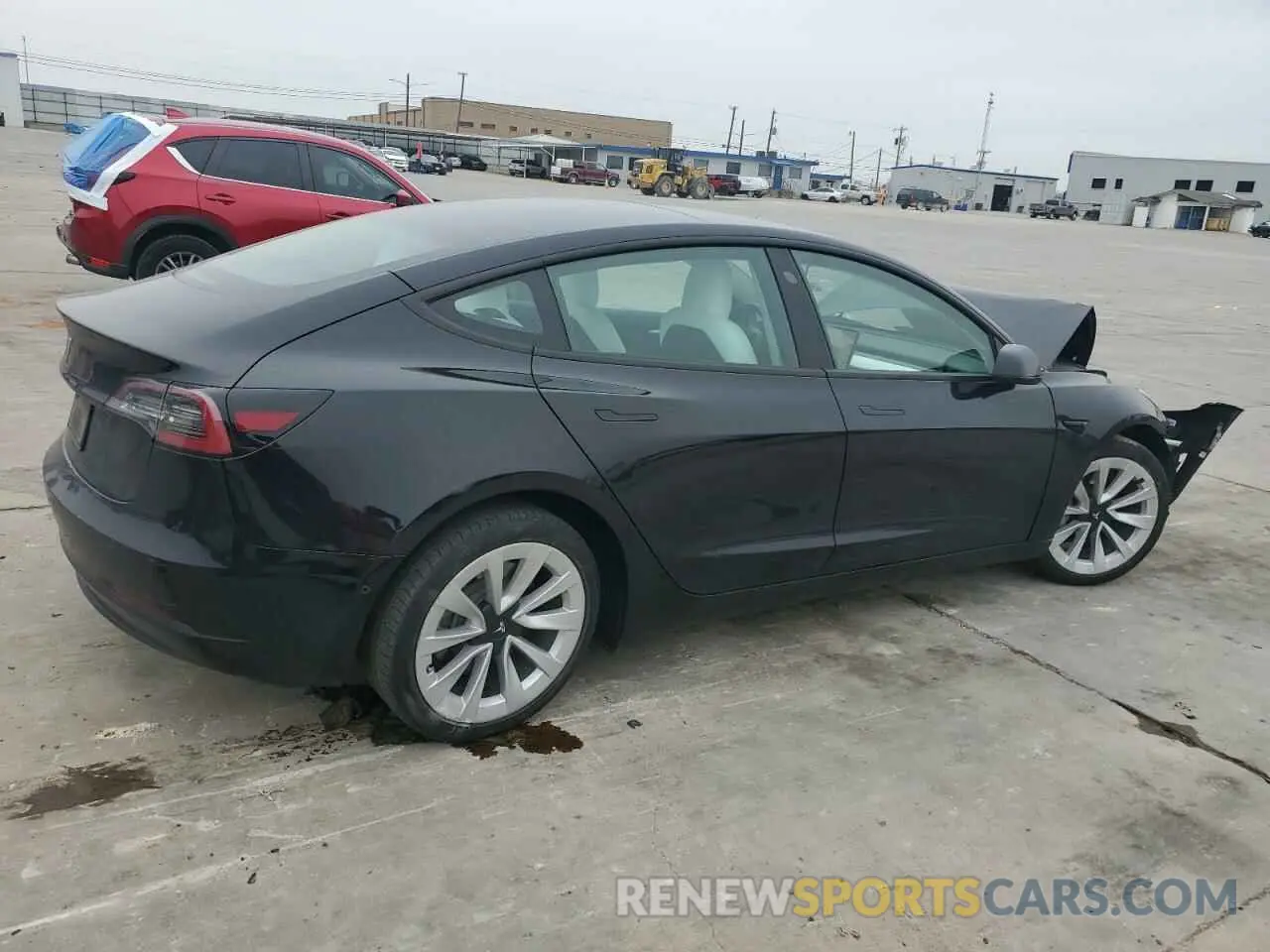 3 fotografías del automóvil dañado 5YJ3E1EAXNF310994 TESLA MODEL 3 2022