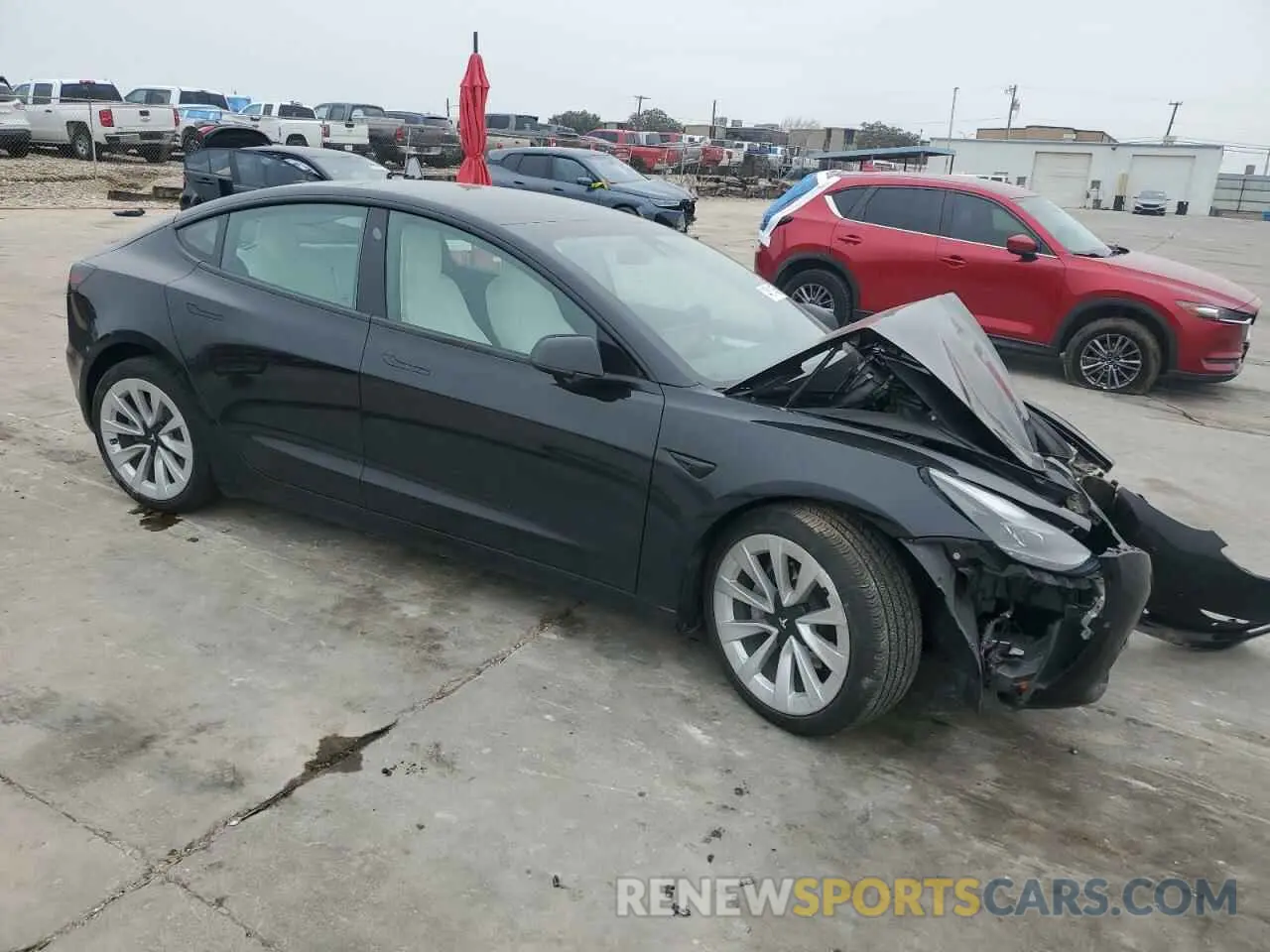 4 fotografías del automóvil dañado 5YJ3E1EAXNF310994 TESLA MODEL 3 2022
