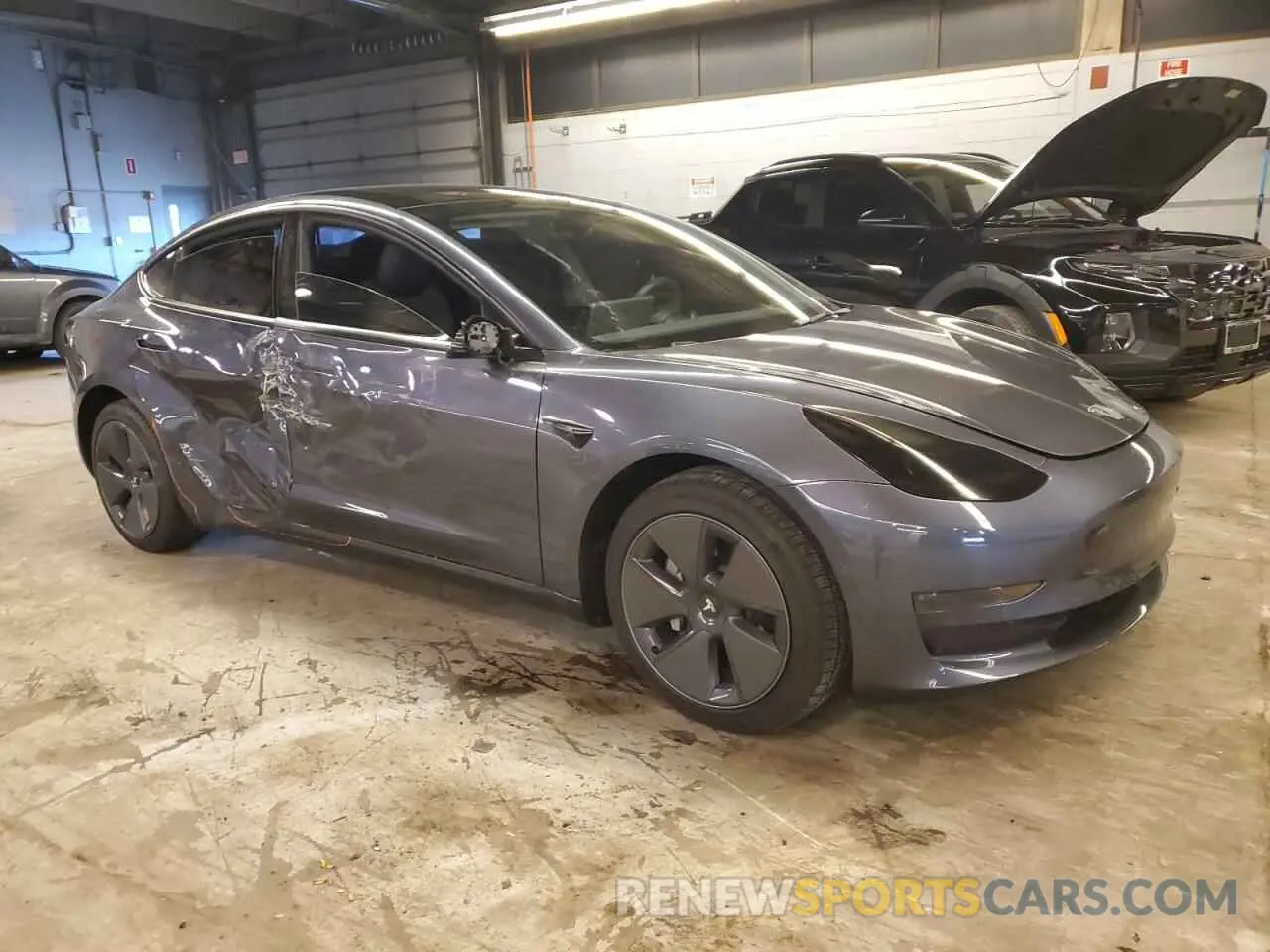 4 fotografías del automóvil dañado 5YJ3E1EAXNF313989 TESLA MODEL 3 2022