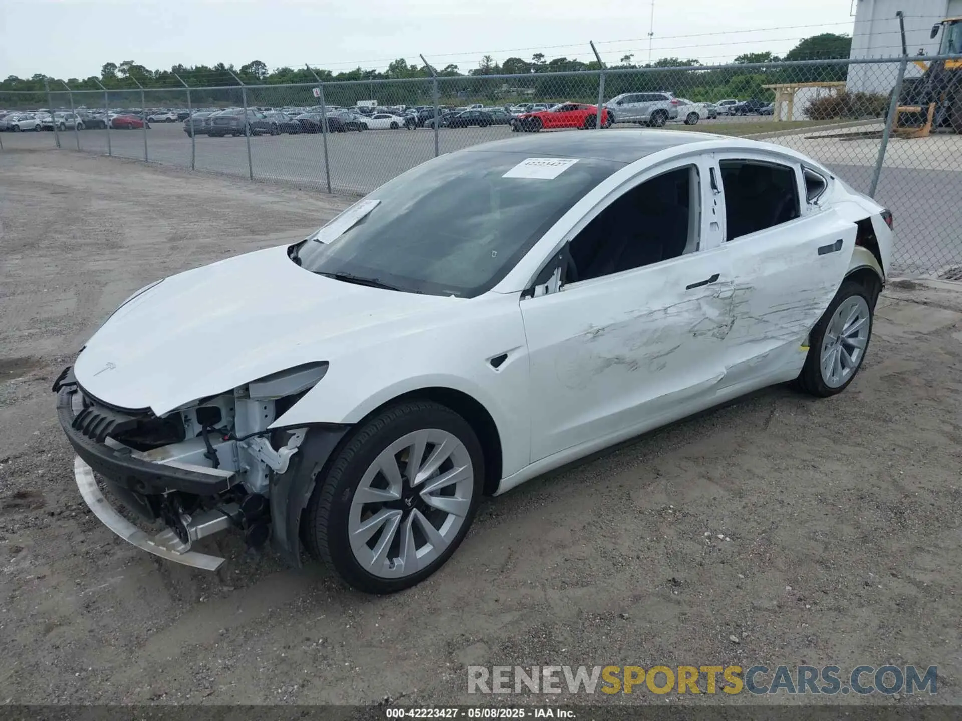 2 fotografías del automóvil dañado 5YJ3E1EAXNF328184 TESLA MODEL 3 2022