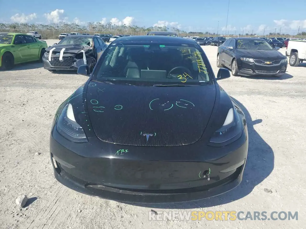 5 fotografías del automóvil dañado 5YJ3E1EAXNF369334 TESLA MODEL 3 2022