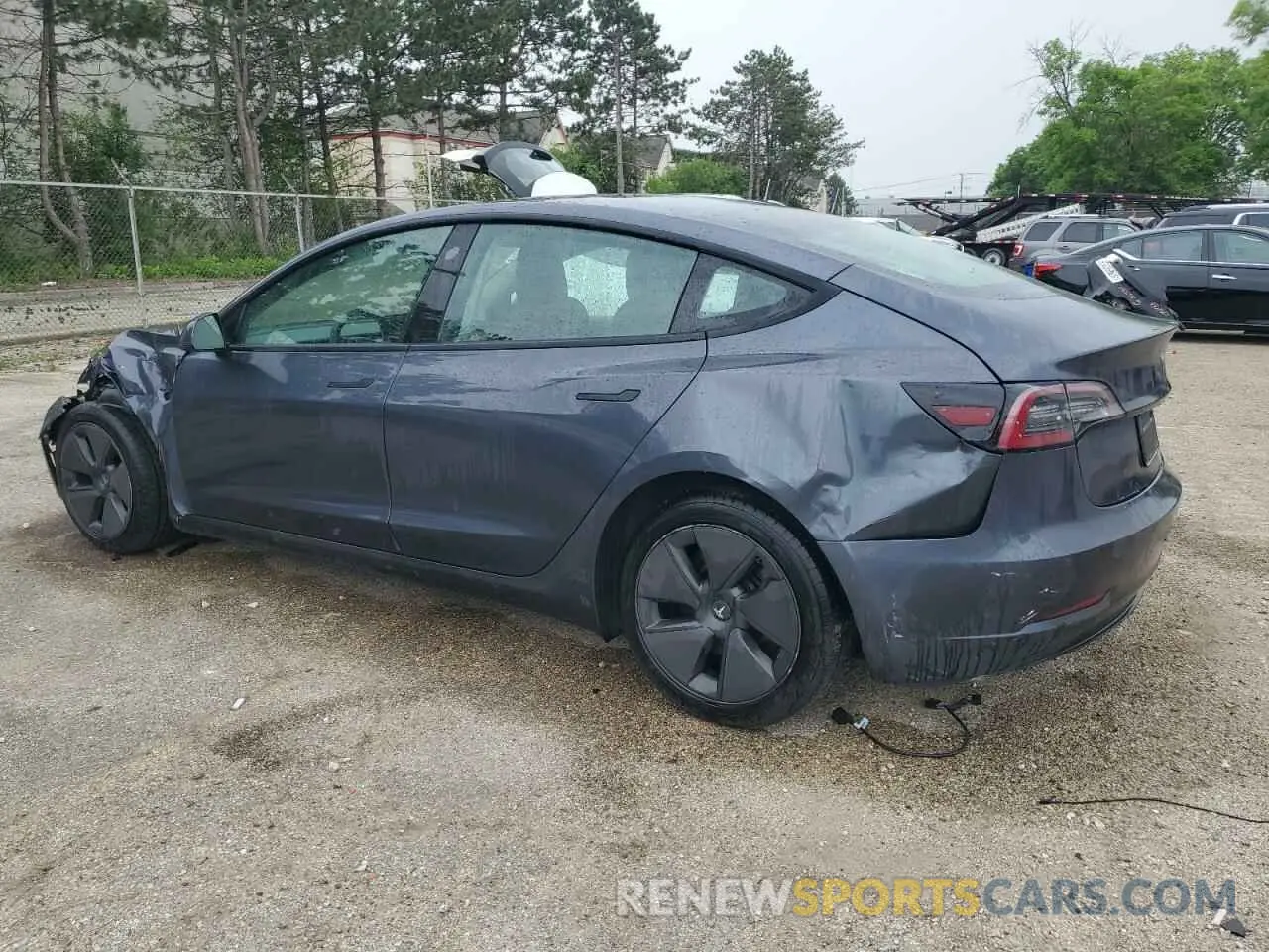 2 fotografías del automóvil dañado 5YJ3E1EAXNF371505 TESLA MODEL 3 2022