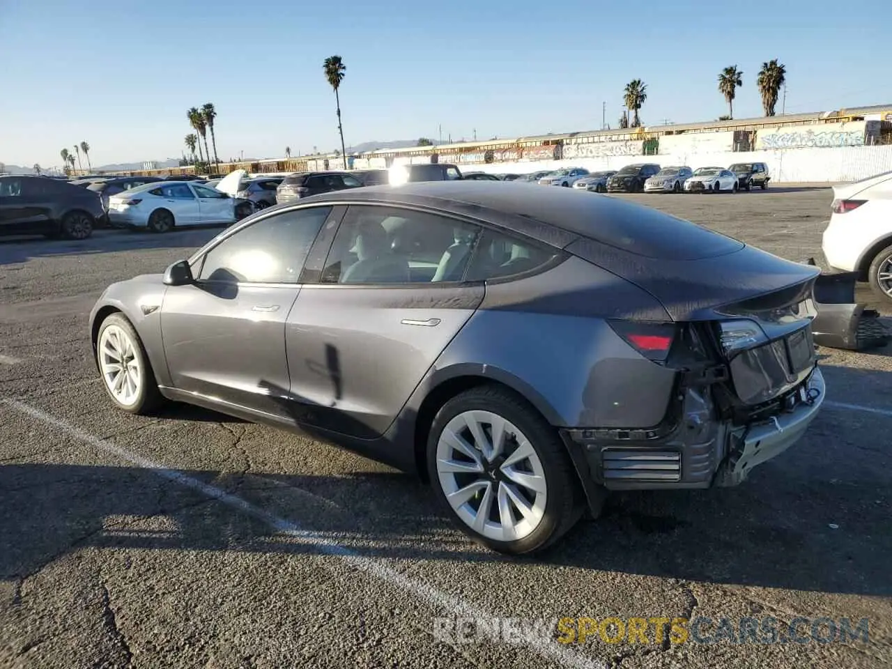 2 fotografías del automóvil dañado 5YJ3E1EAXNF374601 TESLA MODEL 3 2022
