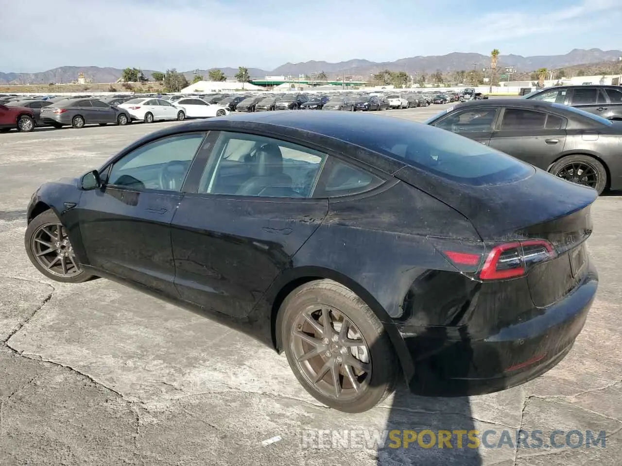 2 fotografías del automóvil dañado 5YJ3E1EAXNF374713 TESLA MODEL 3 2022