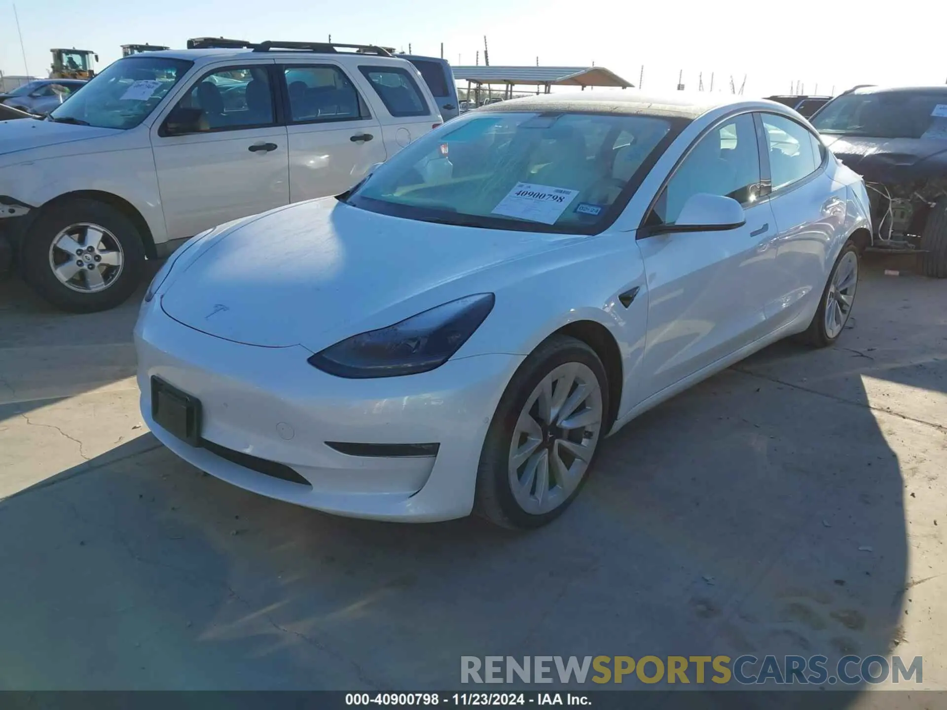 2 fotografías del automóvil dañado 5YJ3E1EB0NF114507 TESLA MODEL 3 2022