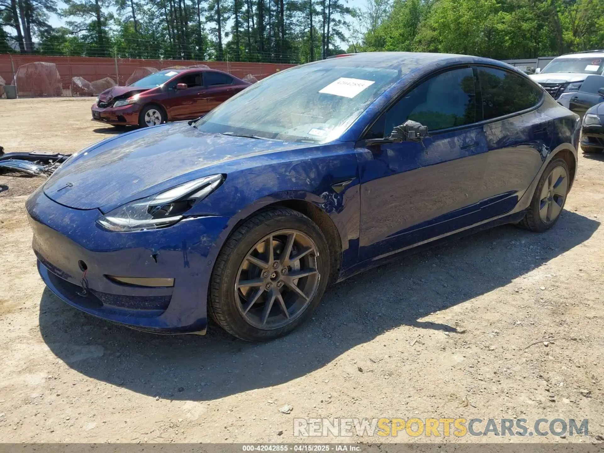 2 fotografías del automóvil dañado 5YJ3E1EB0NF115060 TESLA MODEL 3 2022