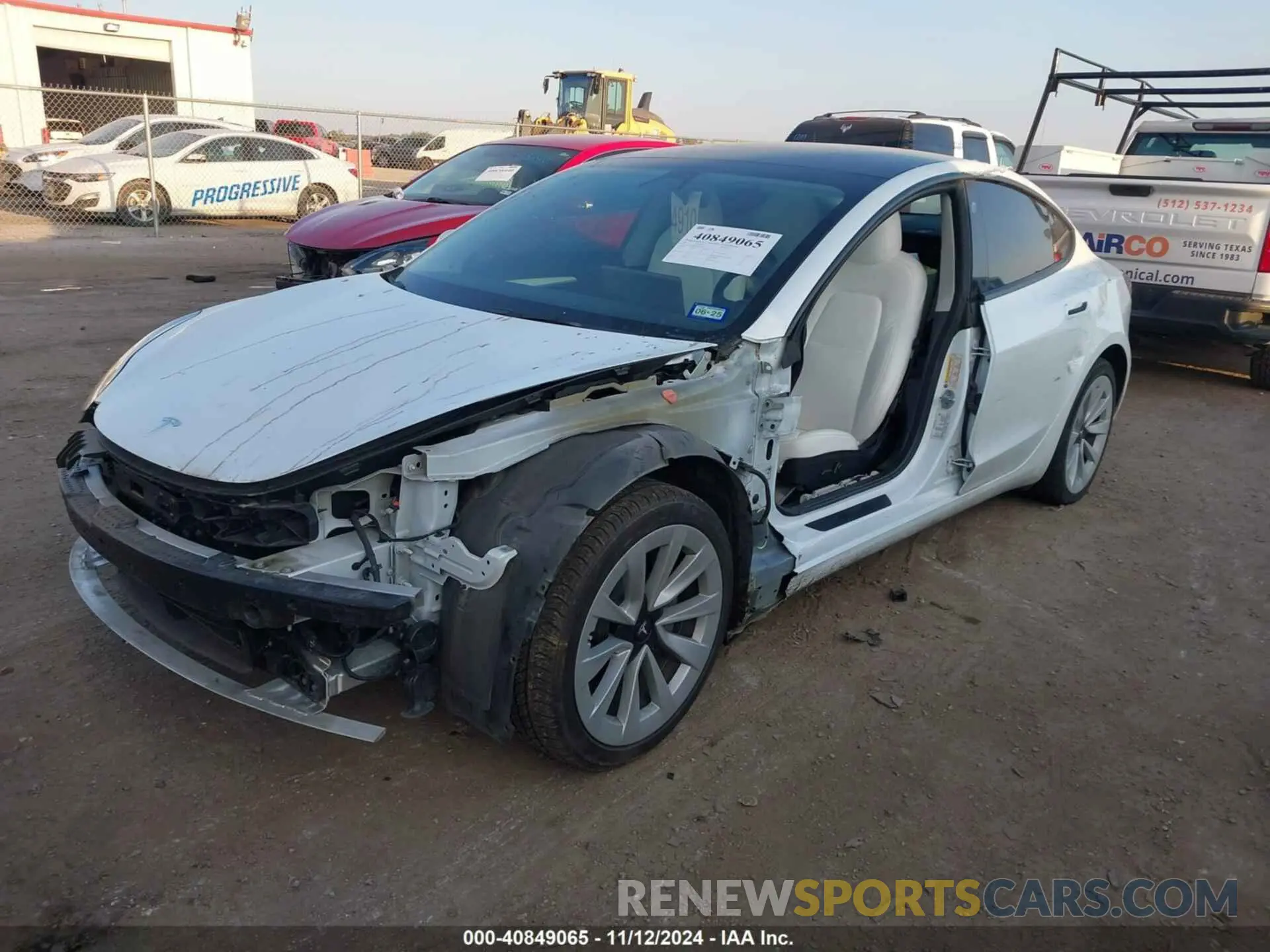 2 fotografías del automóvil dañado 5YJ3E1EB0NF115284 TESLA MODEL 3 2022