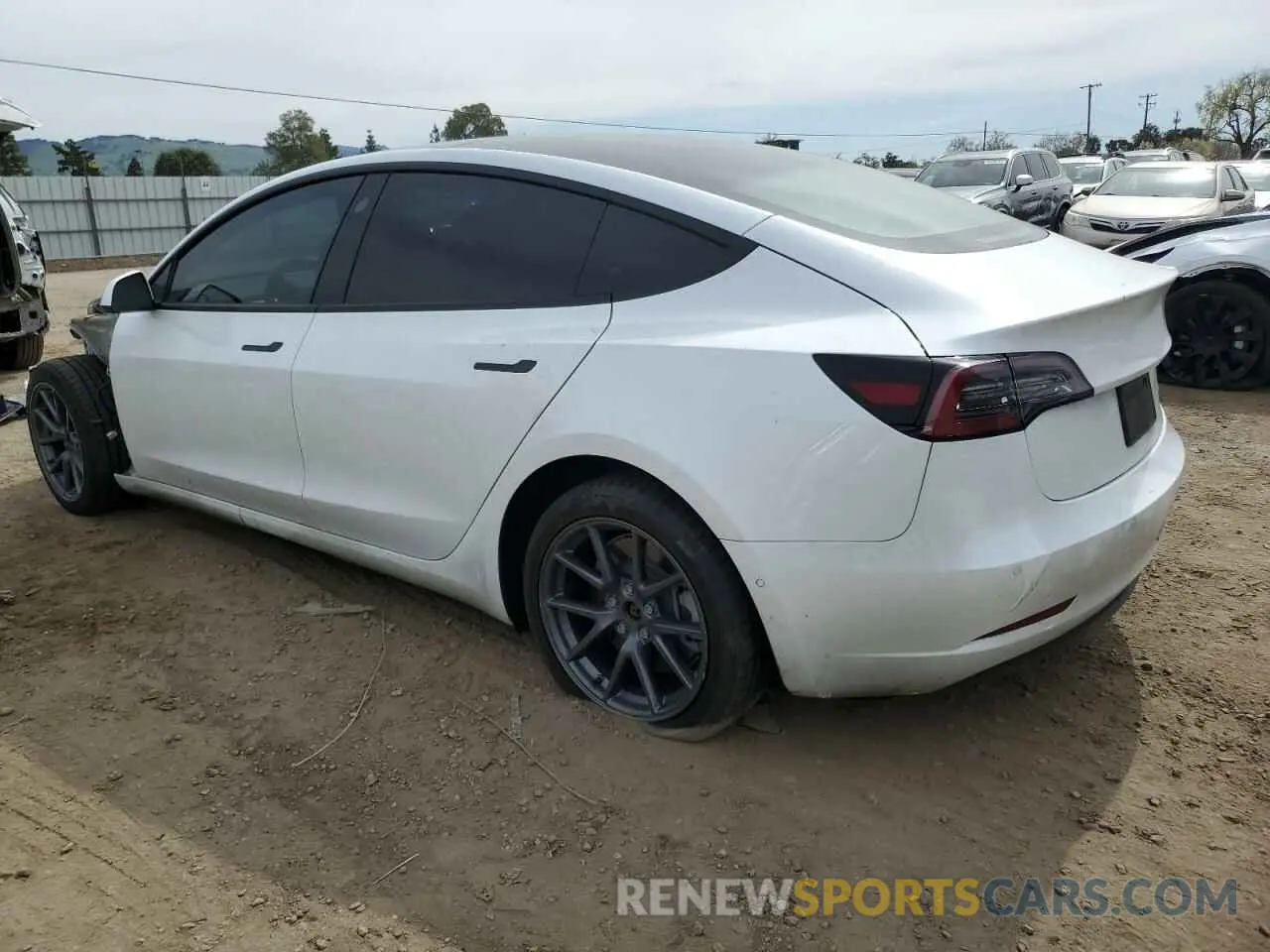 2 fotografías del automóvil dañado 5YJ3E1EB0NF123224 TESLA MODEL 3 2022