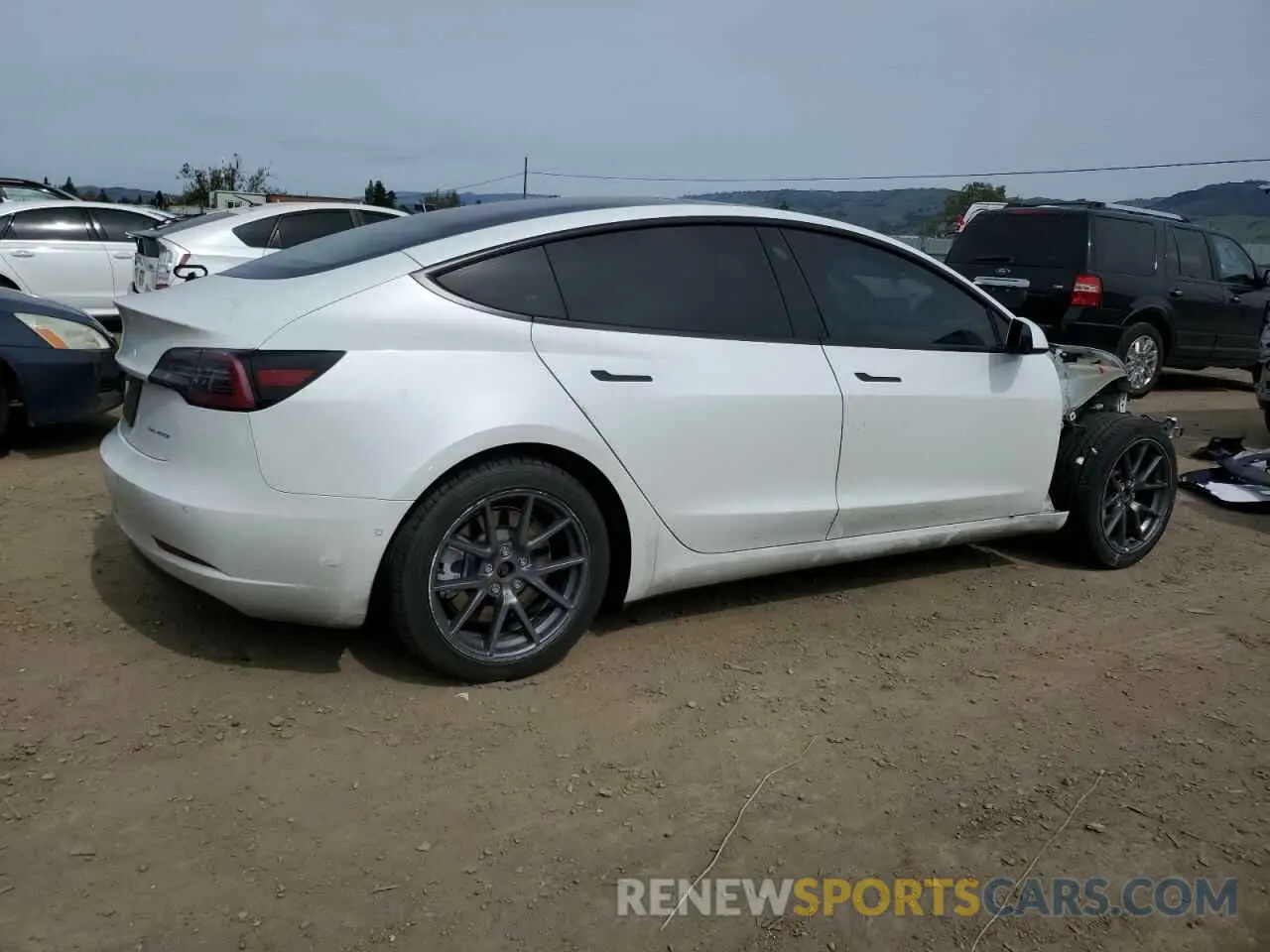 3 fotografías del automóvil dañado 5YJ3E1EB0NF123224 TESLA MODEL 3 2022