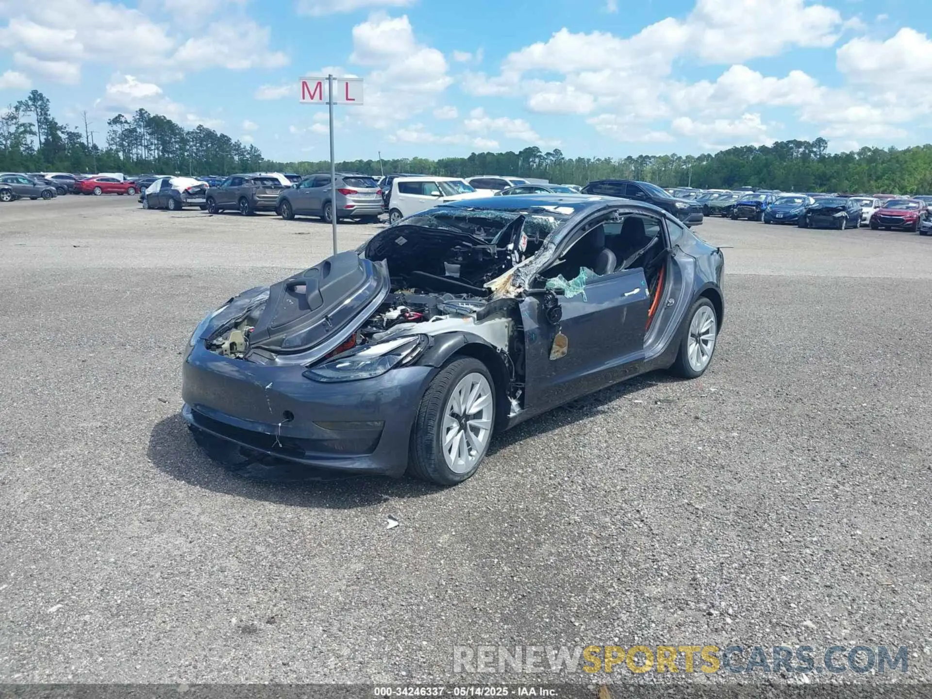 2 fotografías del automóvil dañado 5YJ3E1EB0NF124664 TESLA MODEL 3 2022