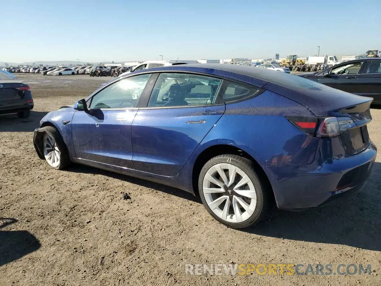 2 fotografías del automóvil dañado 5YJ3E1EB0NF142582 TESLA MODEL 3 2022