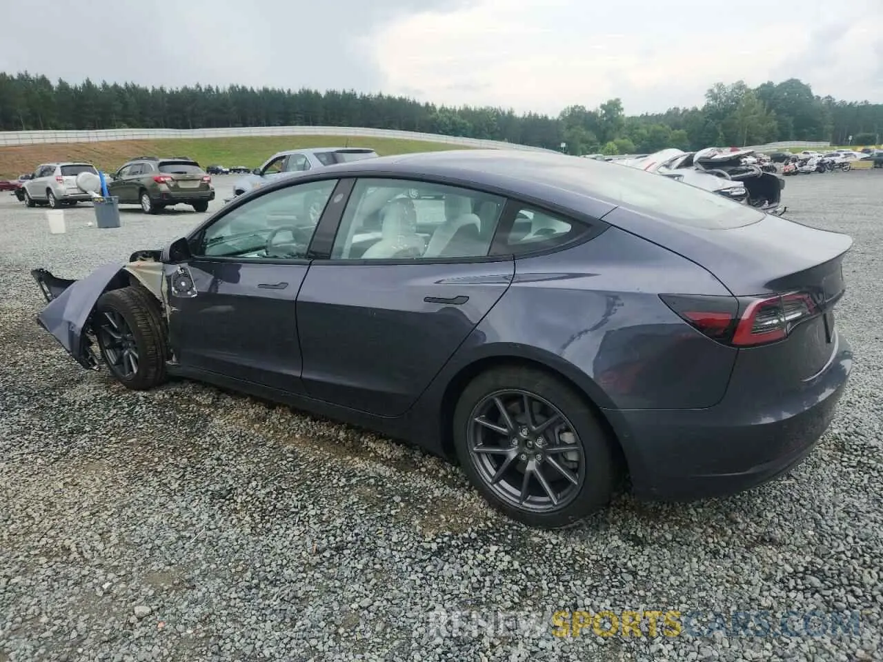 2 fotografías del automóvil dañado 5YJ3E1EB0NF163495 TESLA MODEL 3 2022