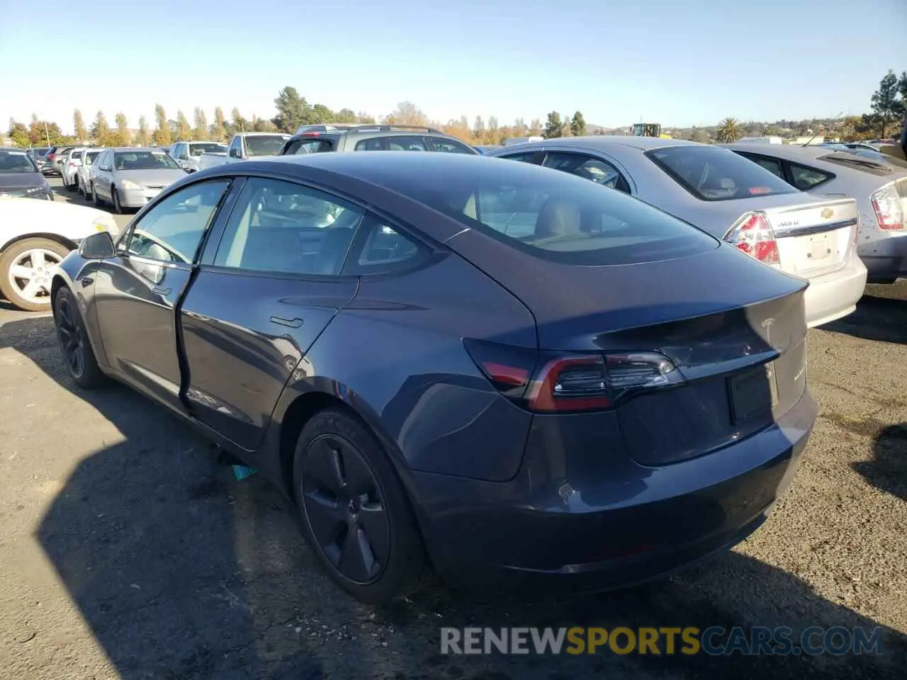 2 fotografías del automóvil dañado 5YJ3E1EB0NF211464 TESLA MODEL 3 2022