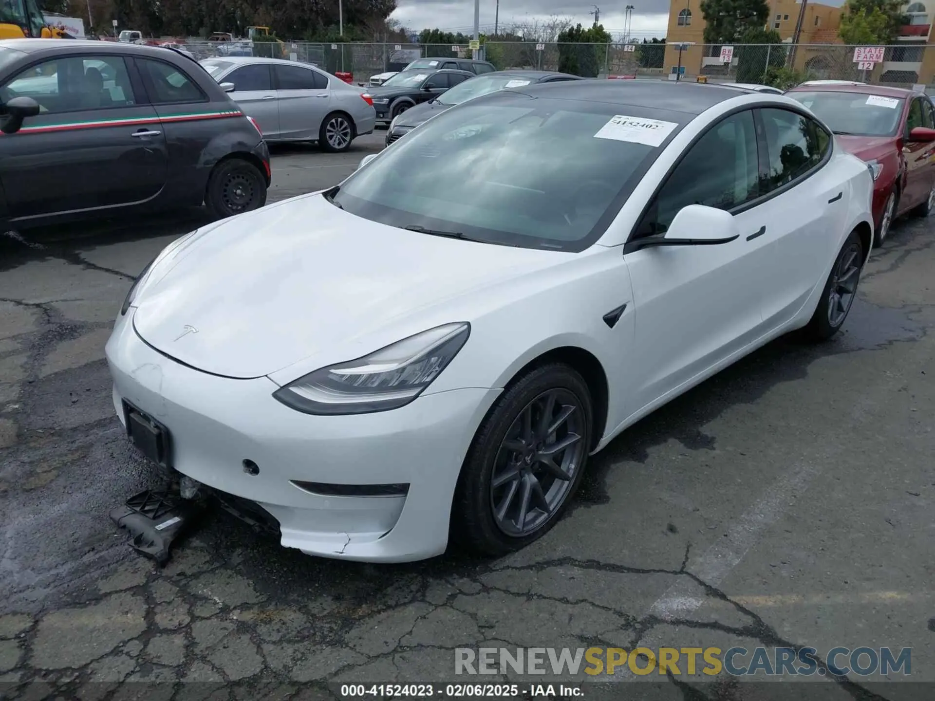2 fotografías del automóvil dañado 5YJ3E1EB0NF259224 TESLA MODEL 3 2022