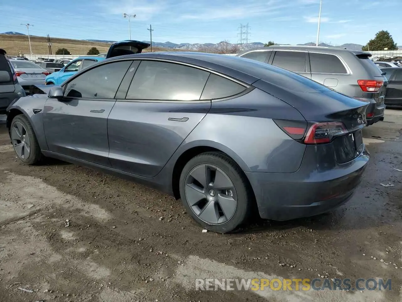 2 fotografías del automóvil dañado 5YJ3E1EB0NF274418 TESLA MODEL 3 2022
