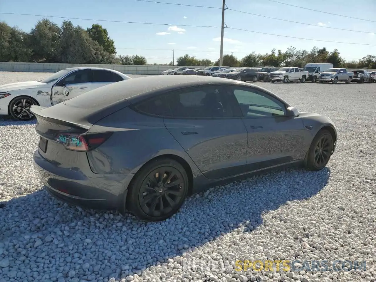 3 fotografías del automóvil dañado 5YJ3E1EB0NF300466 TESLA MODEL 3 2022
