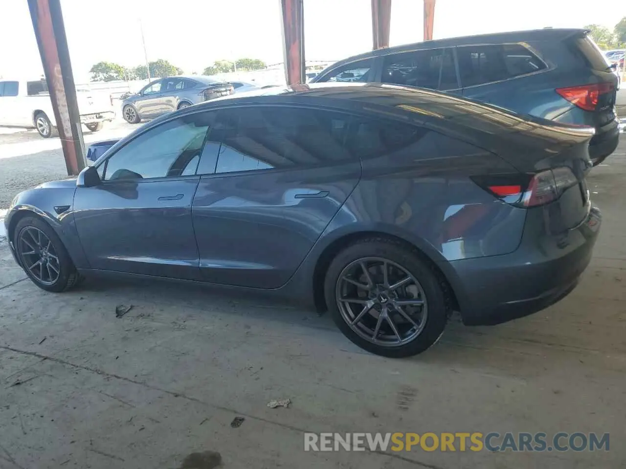 2 fotografías del automóvil dañado 5YJ3E1EB0NF323827 TESLA MODEL 3 2022