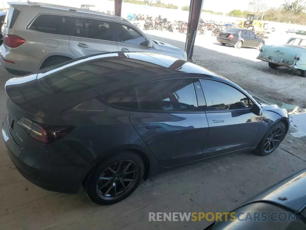 3 fotografías del automóvil dañado 5YJ3E1EB0NF323827 TESLA MODEL 3 2022