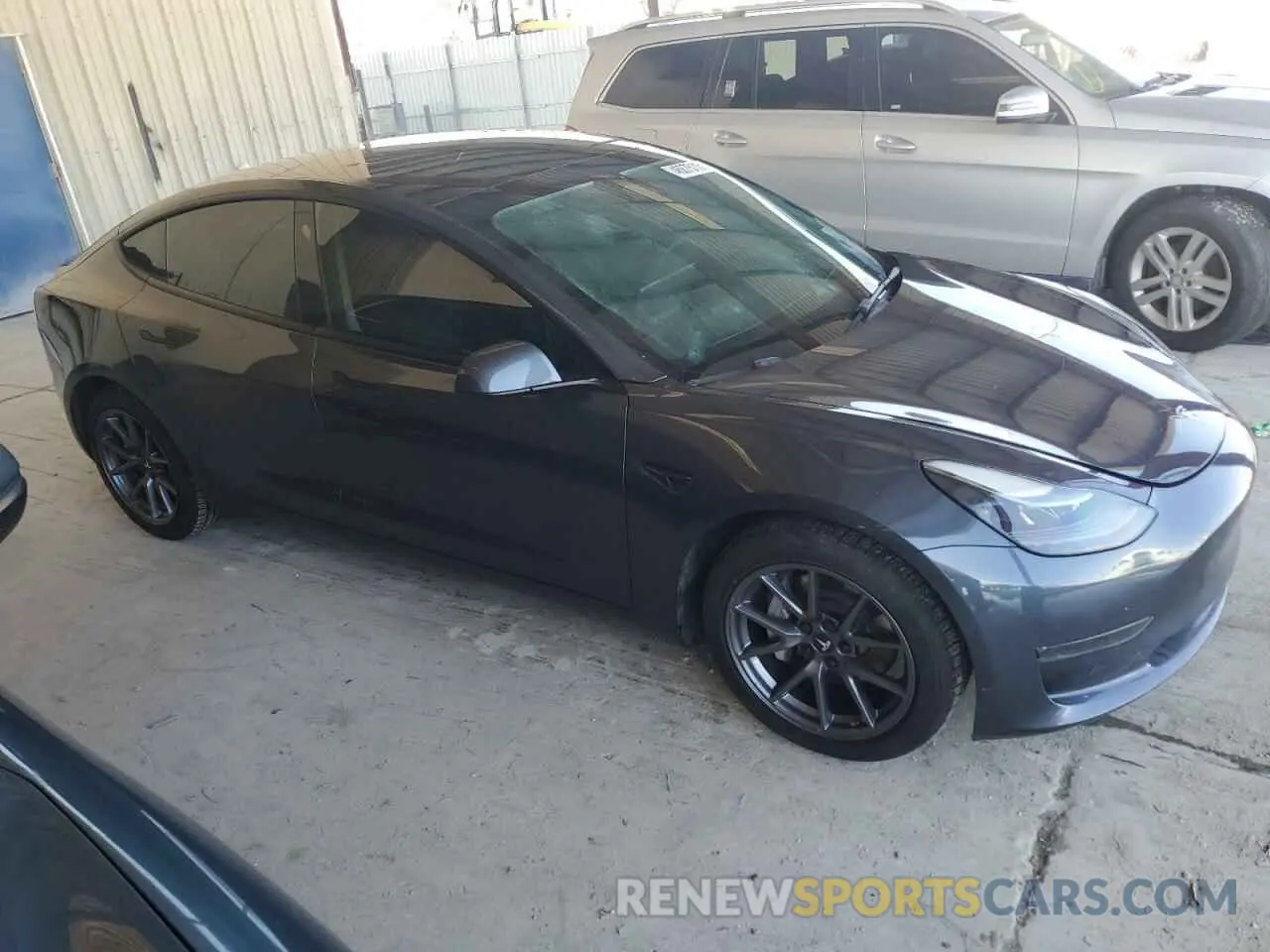 4 fotografías del automóvil dañado 5YJ3E1EB0NF323827 TESLA MODEL 3 2022