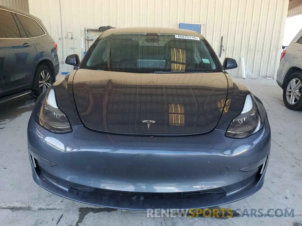 5 fotografías del automóvil dañado 5YJ3E1EB0NF323827 TESLA MODEL 3 2022