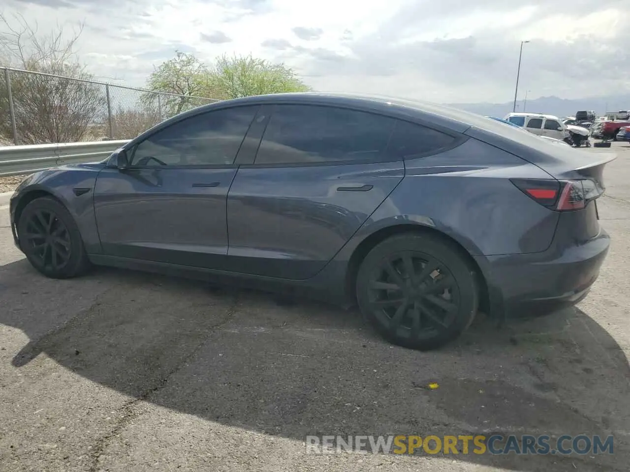 2 fotografías del automóvil dañado 5YJ3E1EB0NF329143 TESLA MODEL 3 2022