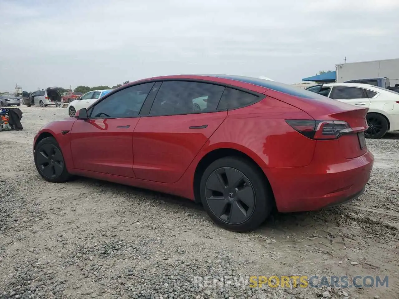 2 fotografías del automóvil dañado 5YJ3E1EB0NF333760 TESLA MODEL 3 2022