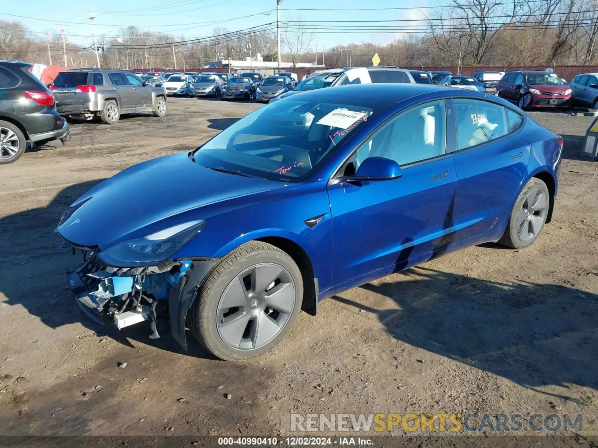 2 fotografías del automóvil dañado 5YJ3E1EB0NF343799 TESLA MODEL 3 2022